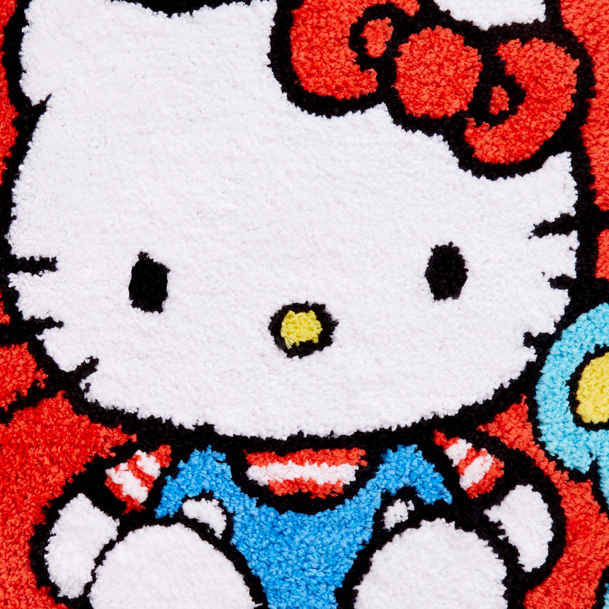 Hello Kitty rug in a childs bedroom, adding a playful touch to the decor.