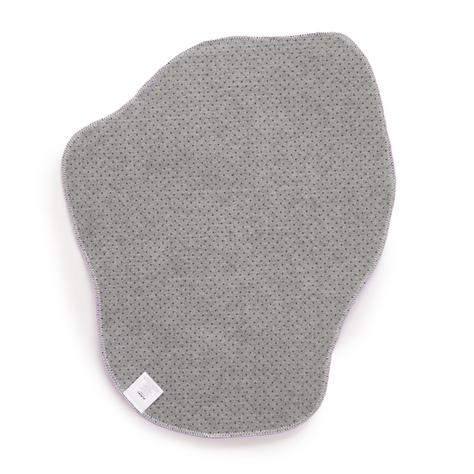 Top view of Kuromi accent rug placed in a kawaii-style bedroom