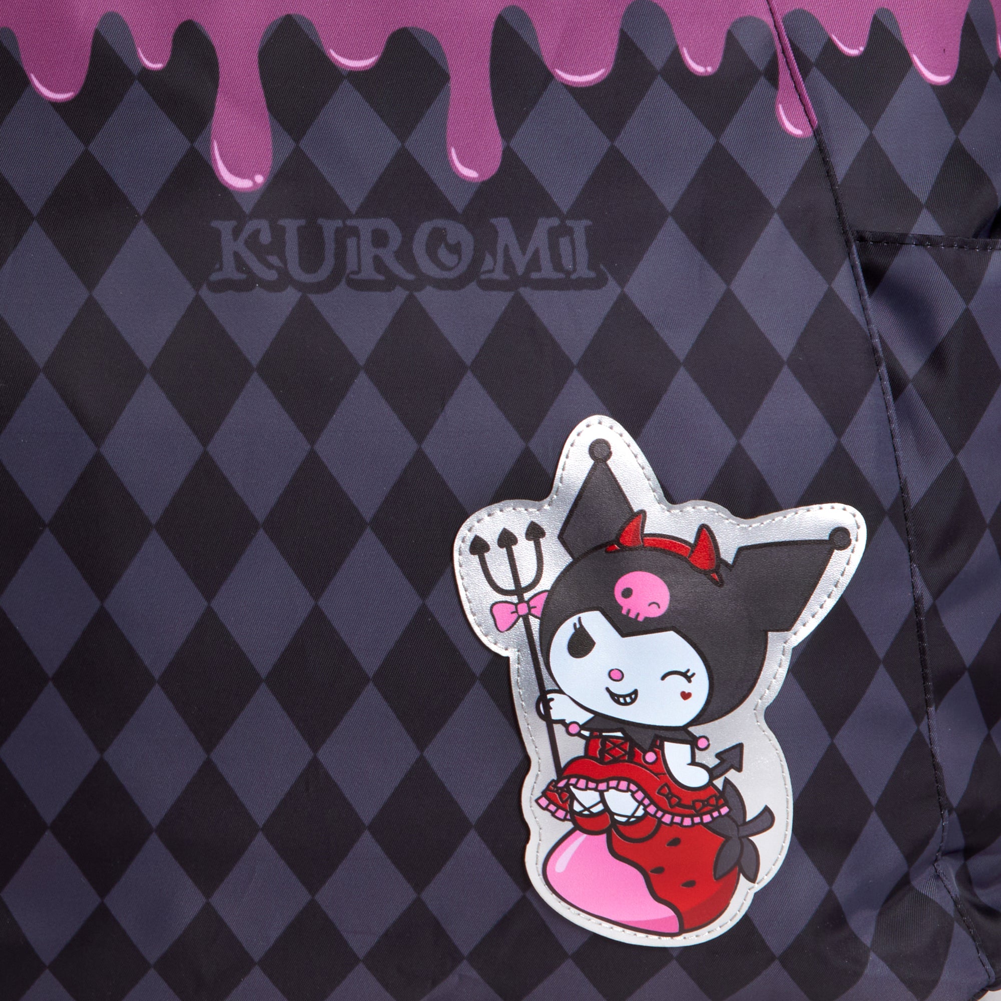 Close-up of the internal pocket of the Kuromi tote, emphasizing organization features.