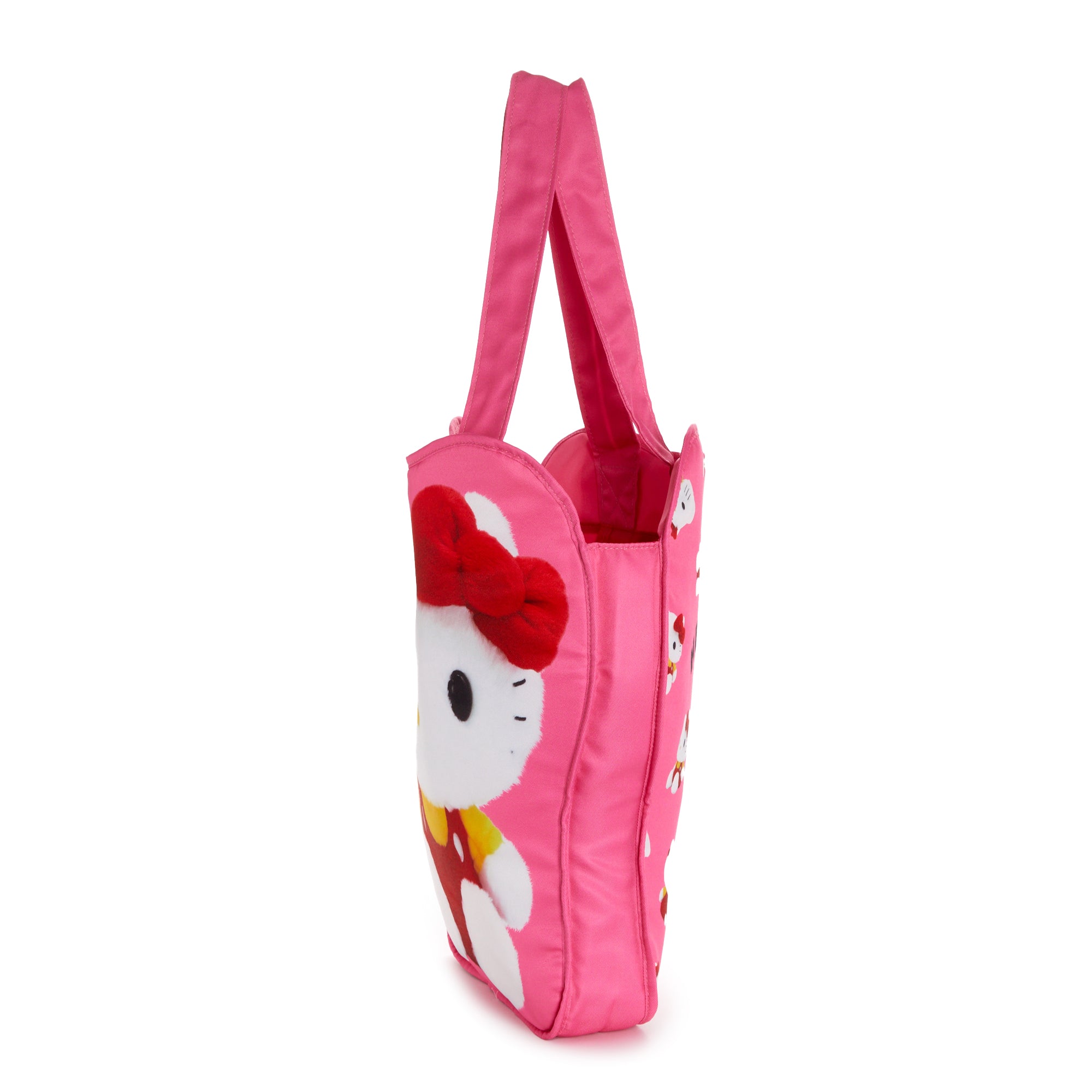 Close-up of Hello Kitty tote bag with vibrant graphic and all-over print design