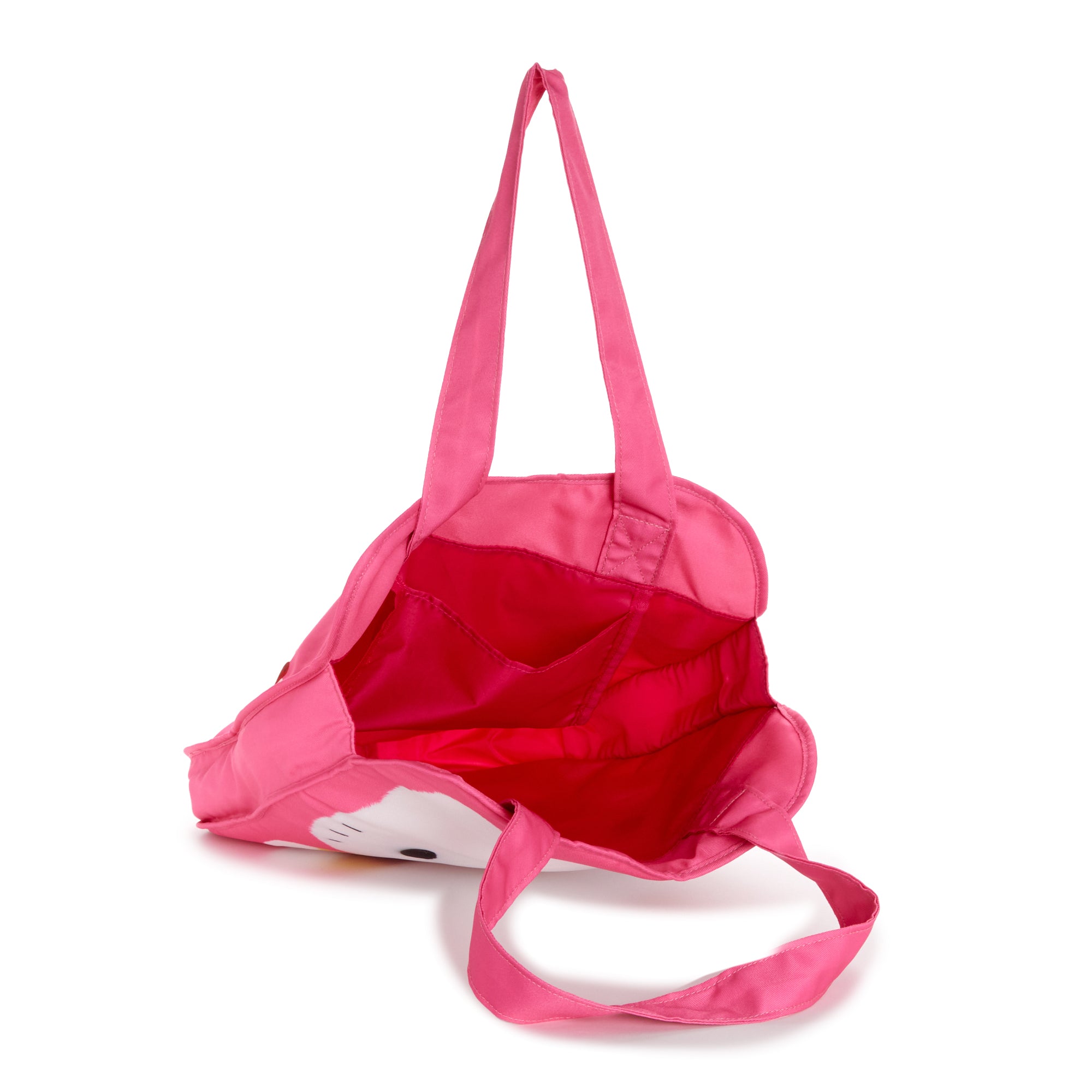 Lifestyle shot of someone carrying the Hello Kitty tote bag during a casual outing