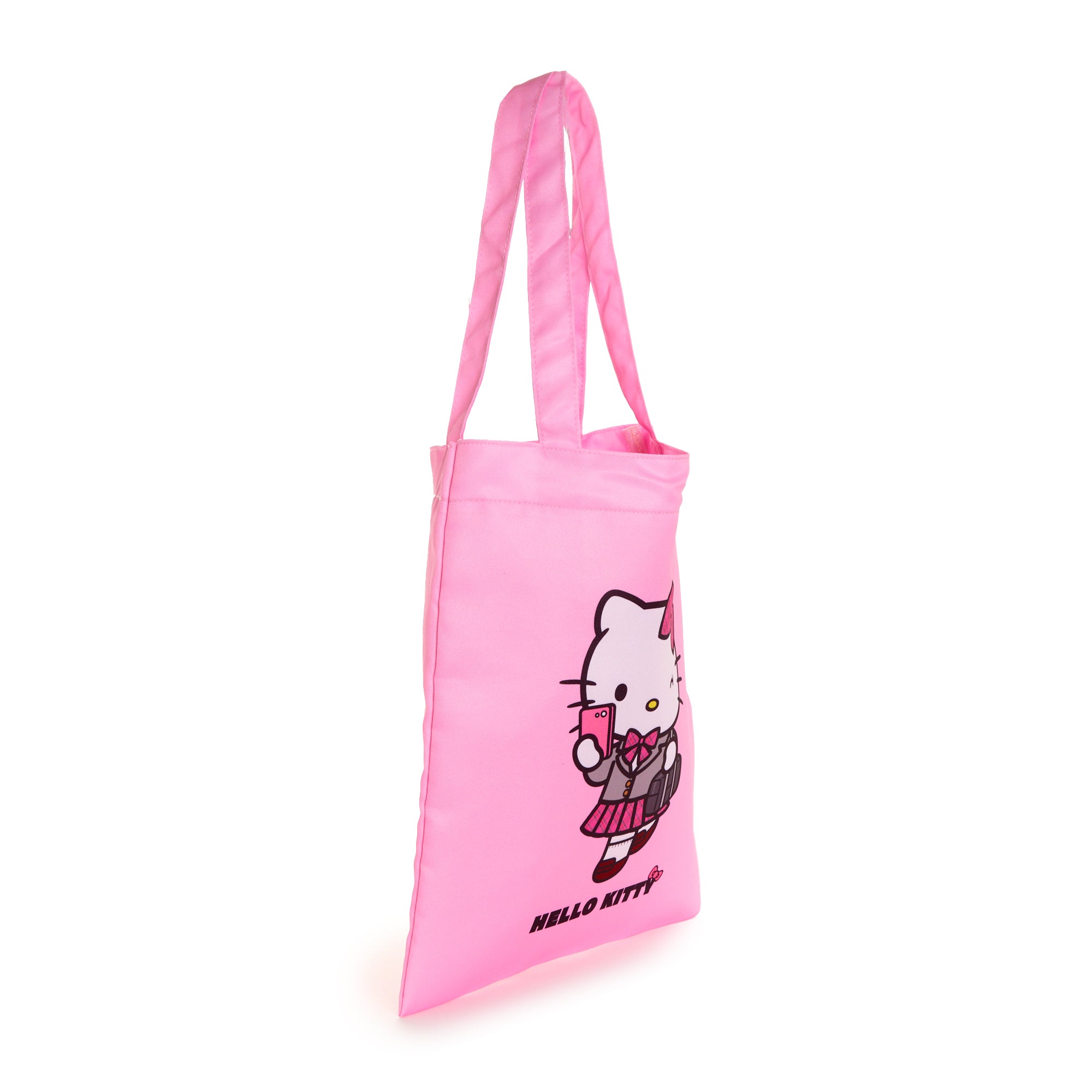 Stylish girl carrying the Hello Kitty tote bag on a sunny day.