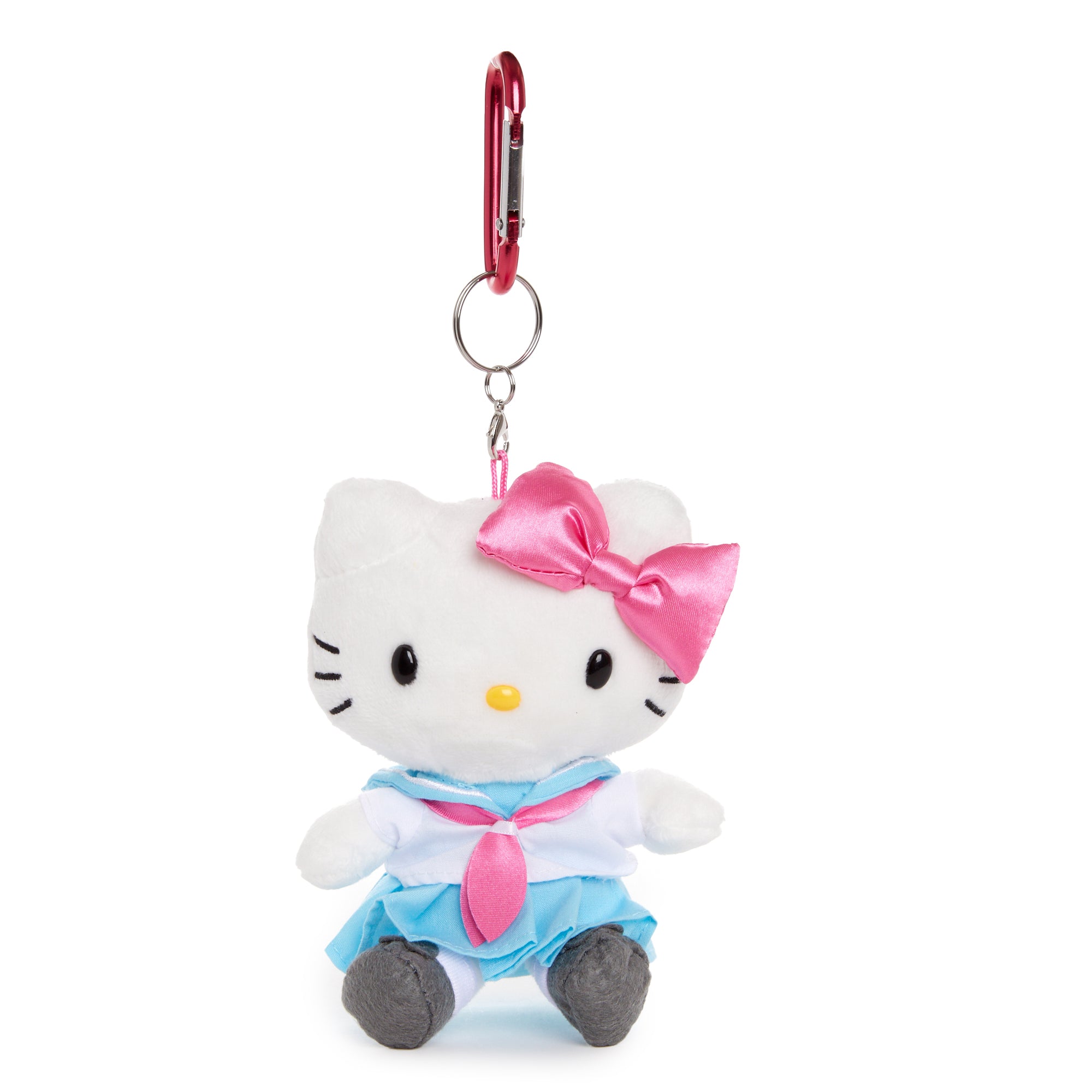 Hello Kitty Sailor mascot plush displayed on a Kawaii-themed desk