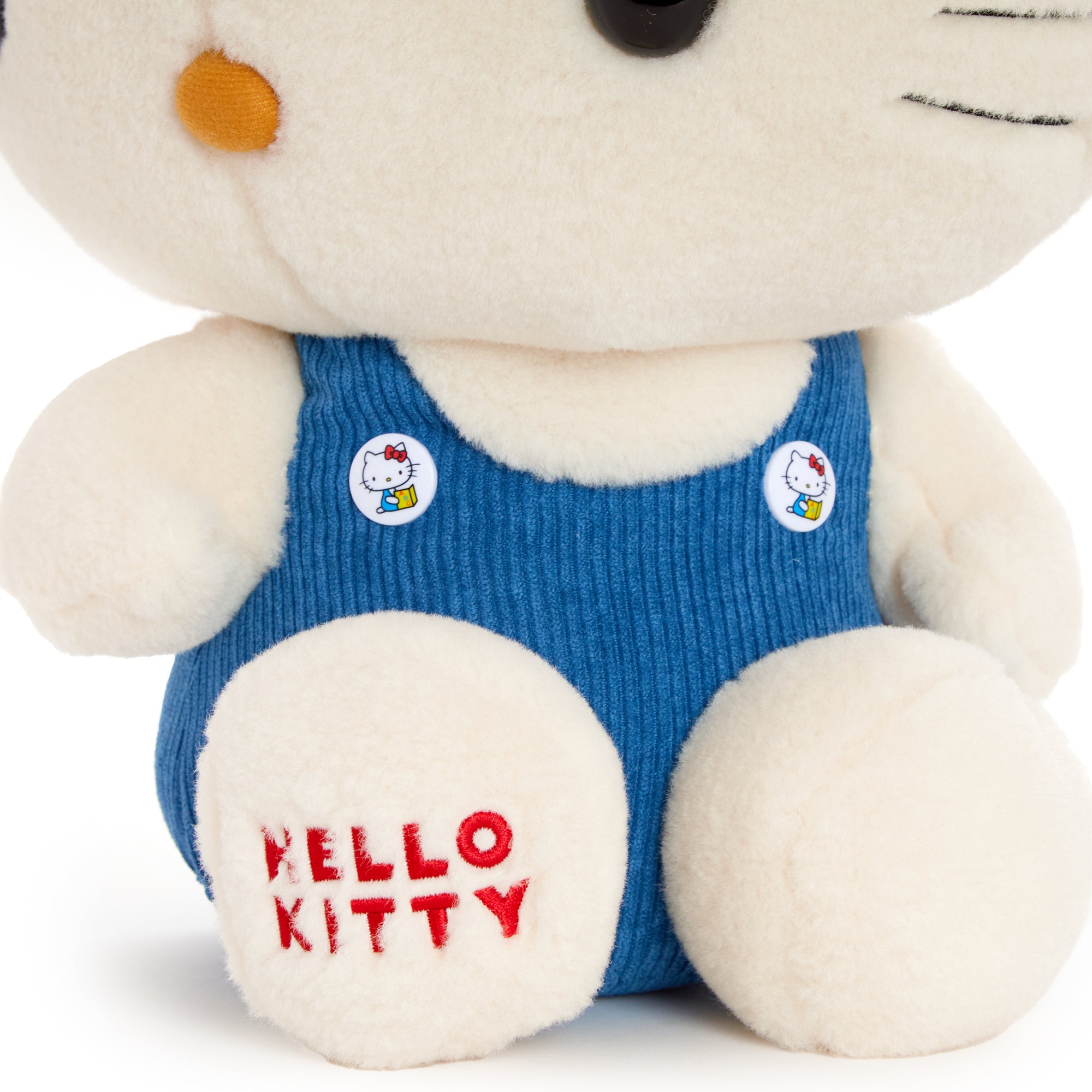 Backpack-ready Hello Kitty plush set in drawstring bag.