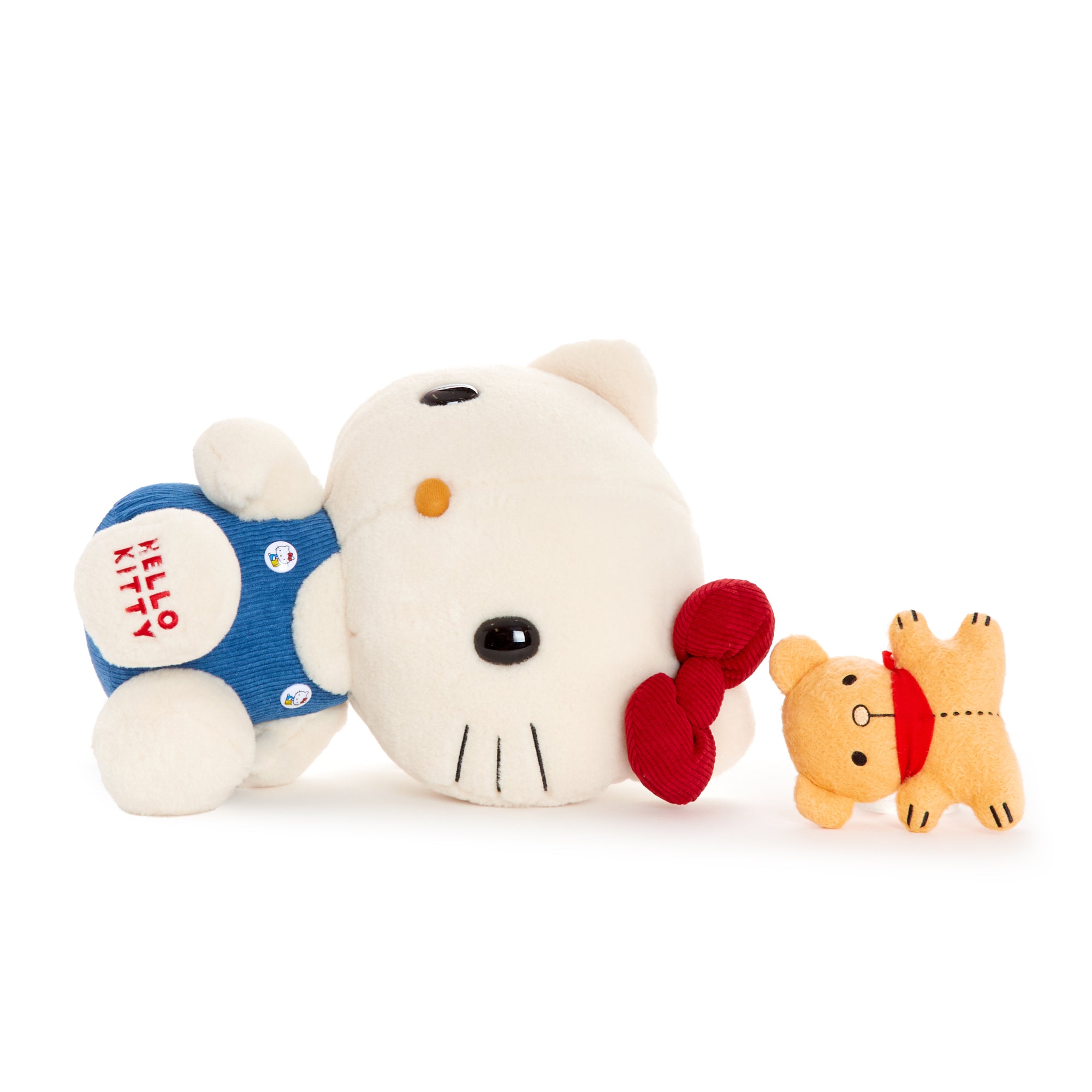 Hello Kitty 17" plush with blue overalls and red bow, sitting with teddy bear.