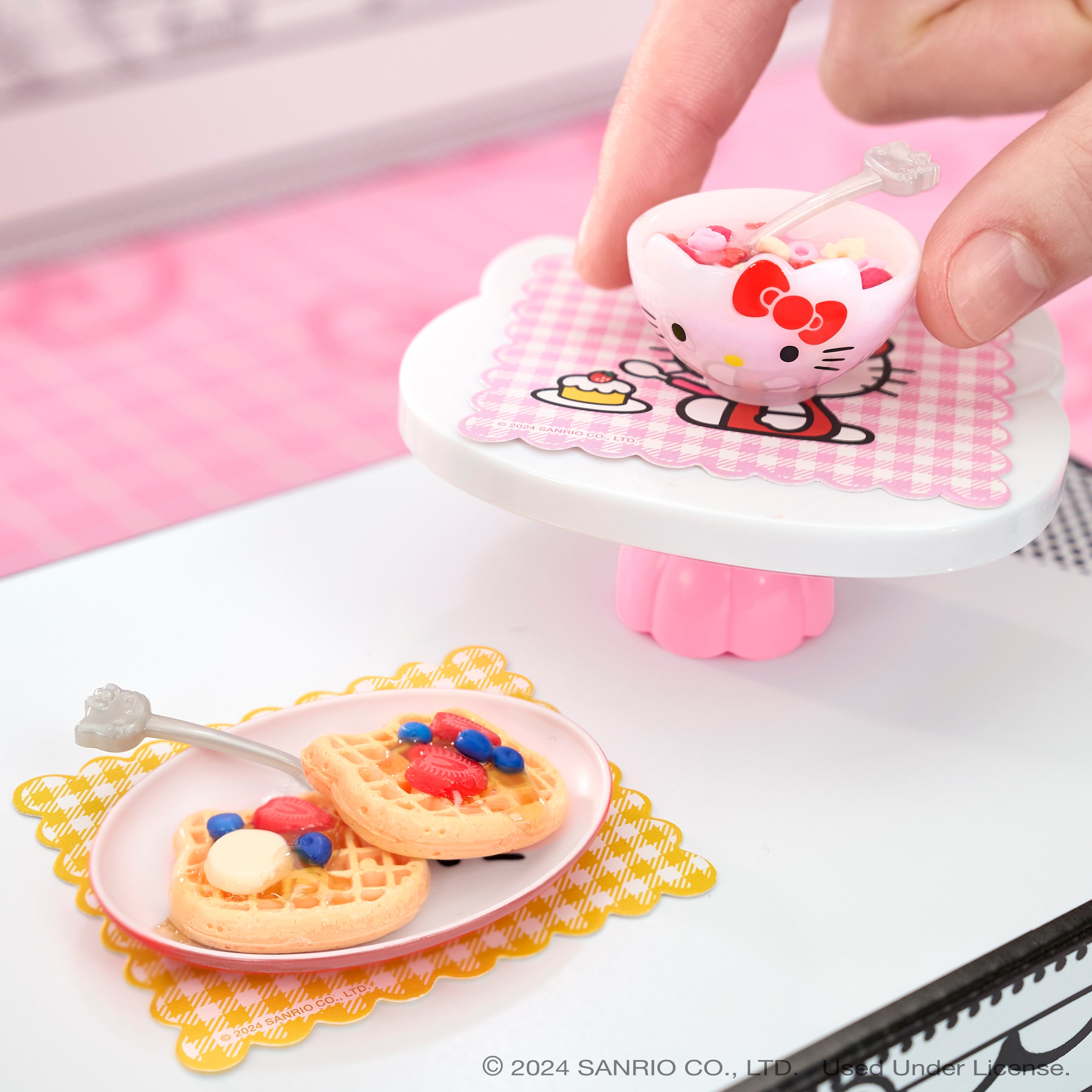 Creative setup of completed Hello Kitty mini food display.