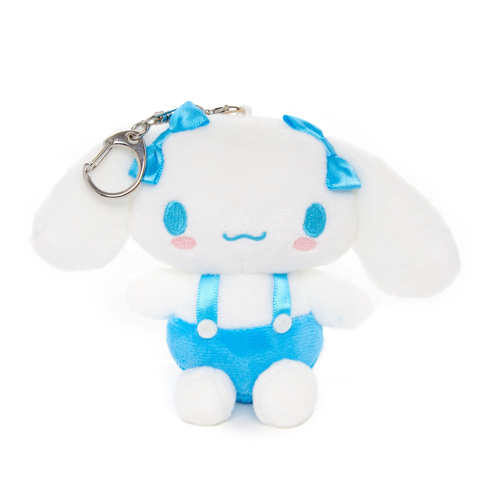 Side view showing embroidered details on cinnamon roll Sanrio plush