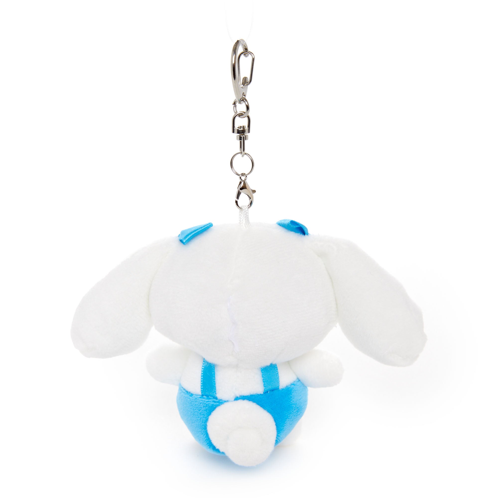 Sanrio mocha plush mascot hanging from a student backpack zipper