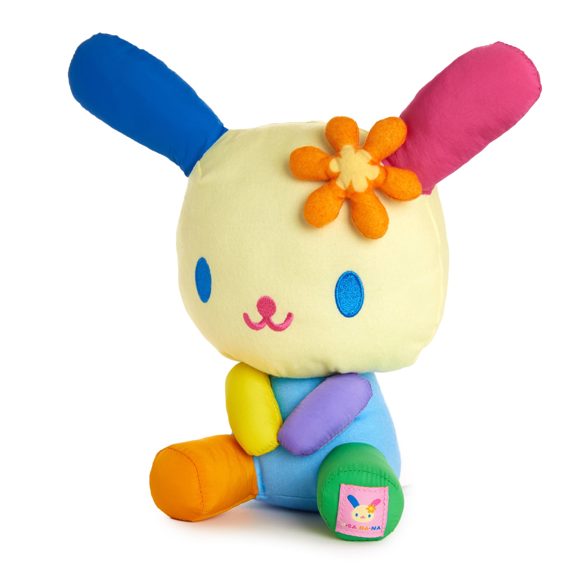 Close-up of U*SA*HA*NA bunny plush toy with colorful details.