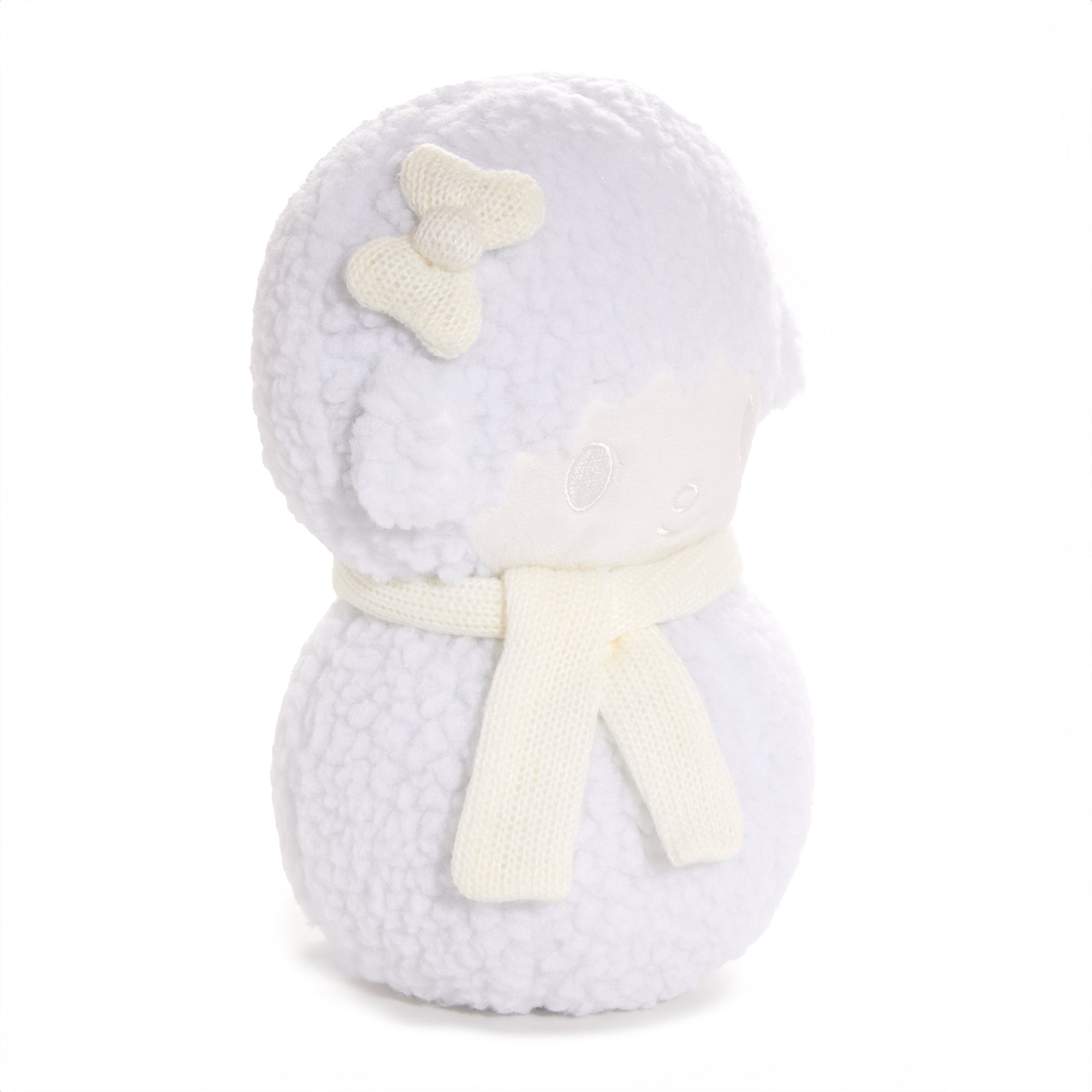 My Sweet Piano plush in a holiday setting, highlighting its boucle texture and scarf.