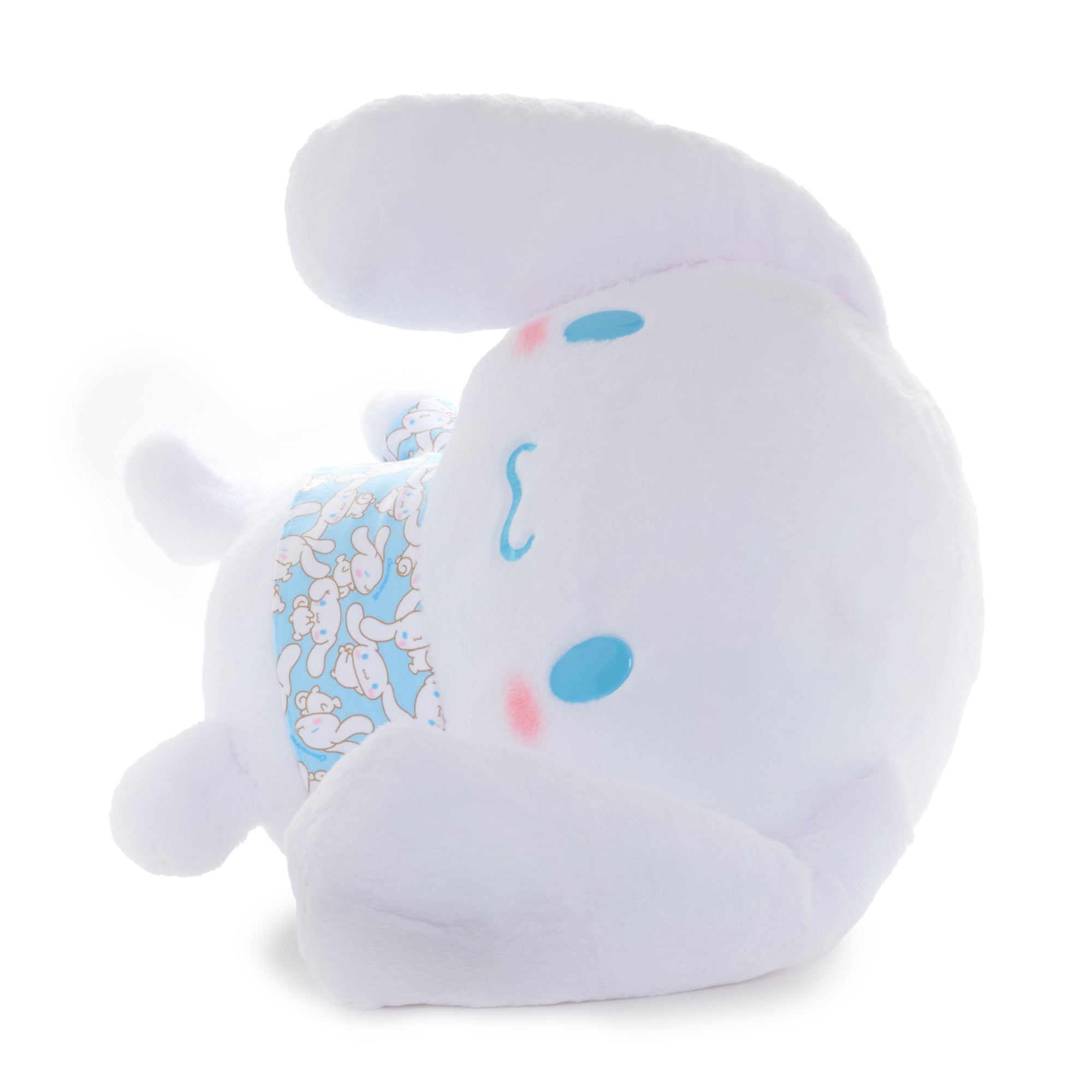 Close-up of Cinnamoroll plush toy’s embroidered face and soft fabric