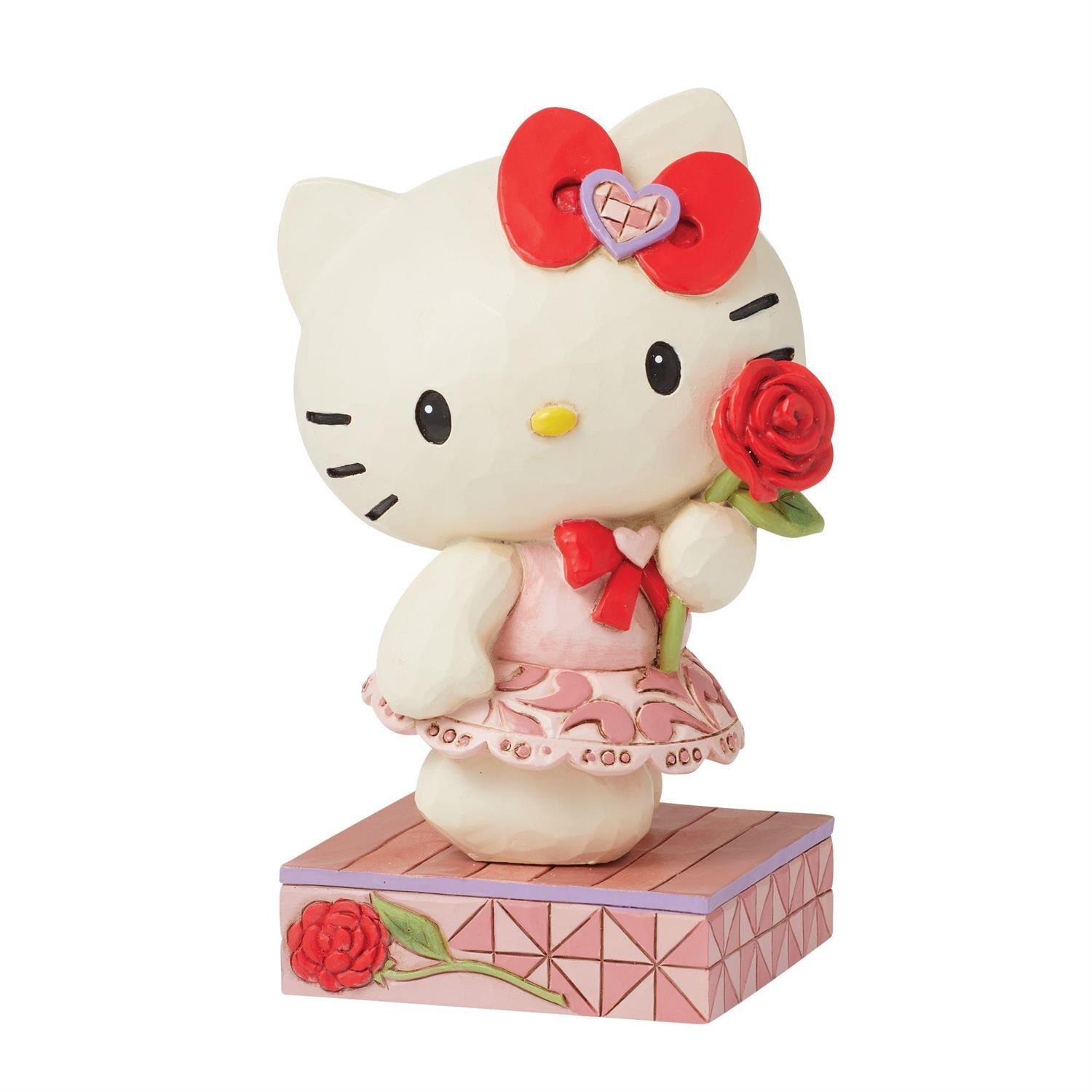 Hello Kitty Rose Figurine front view, showcasing intricate rosemaling design Hello Kitty Rose Figurine front view, showcasing intricate rosemaling design