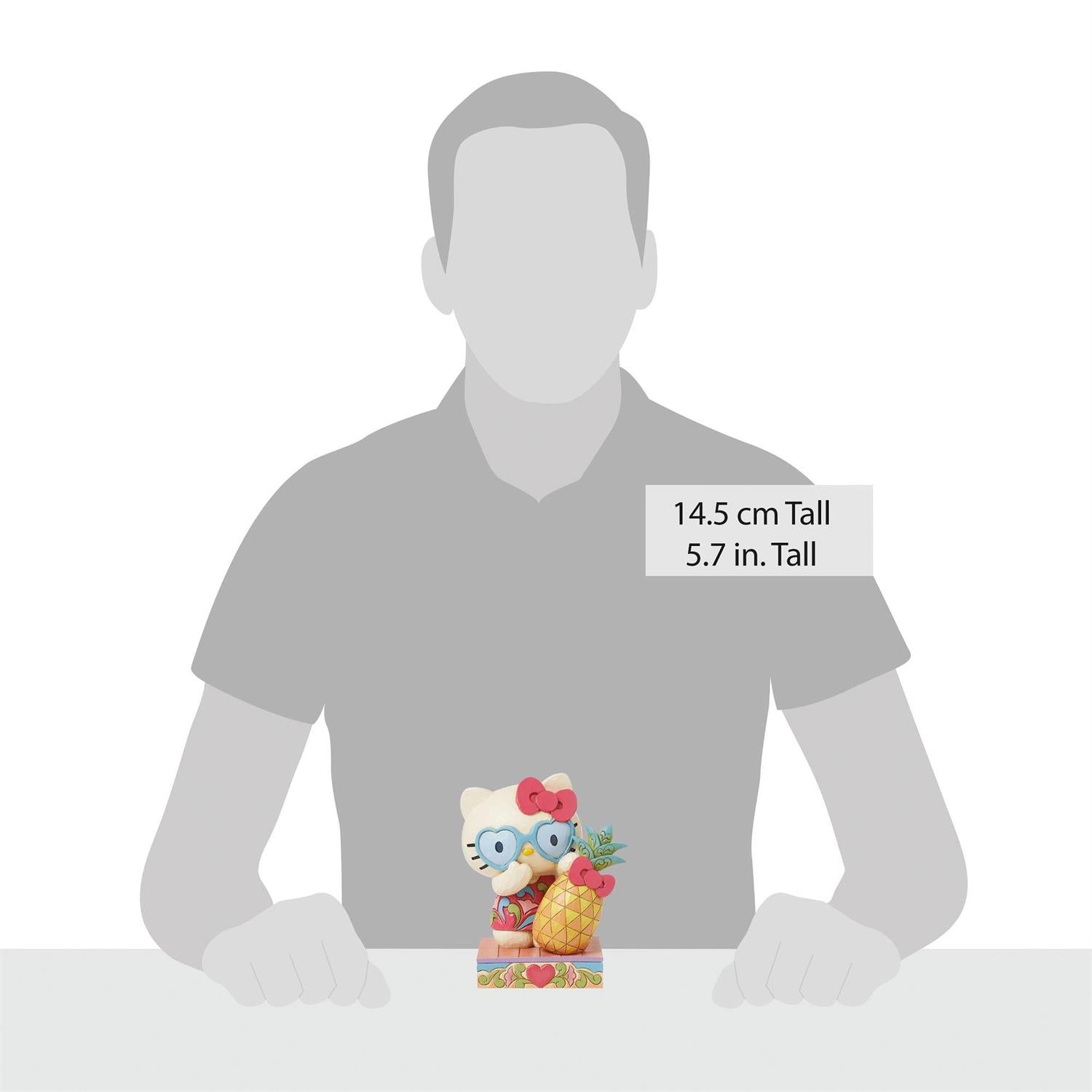 Jim Shore Hello Kitty pineapple figurine front view showcasing floral details