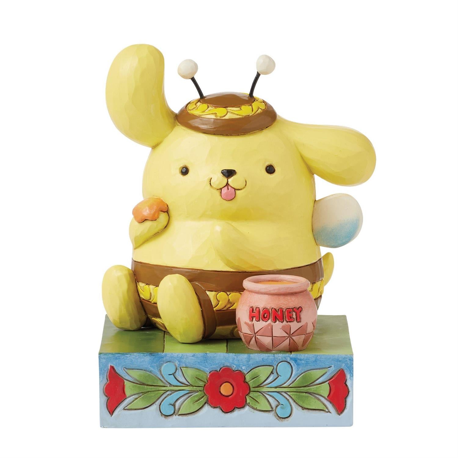 Front view of Pompompurin bumblebee figurine with intricate details