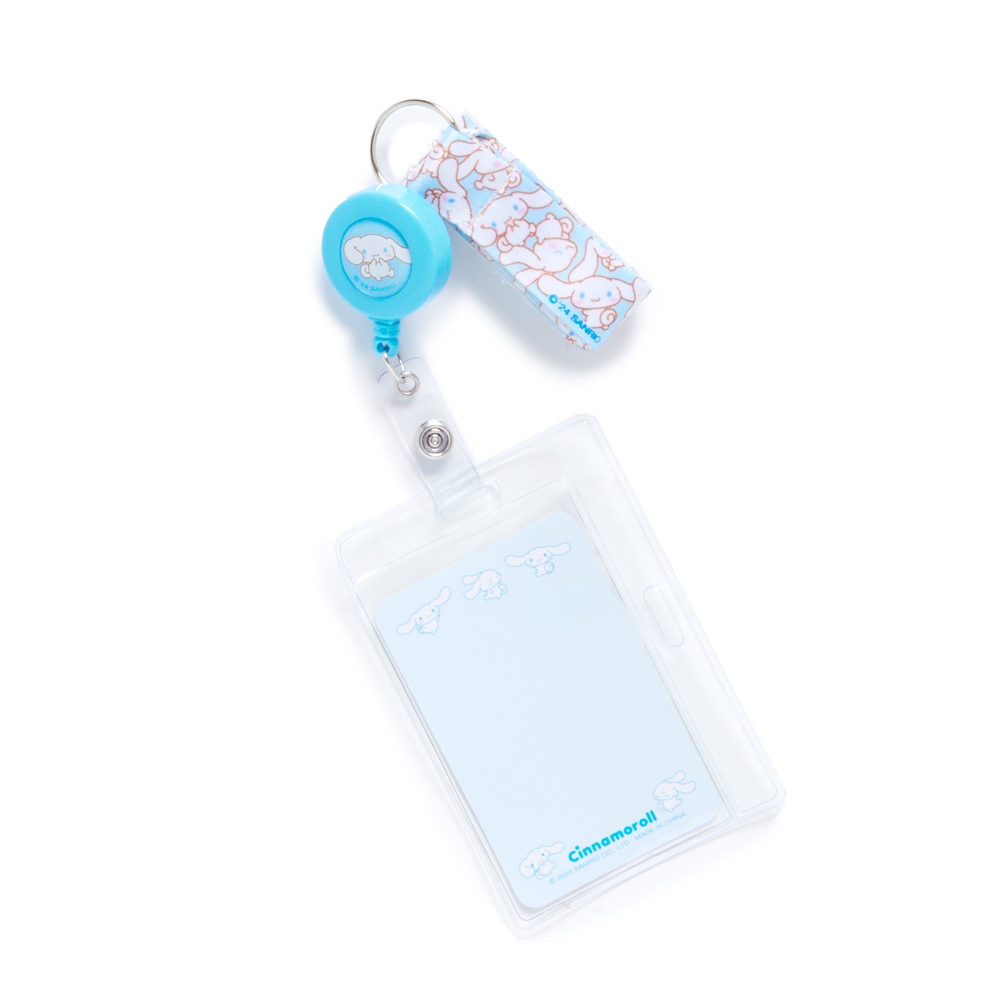 Cute Sanrio accessories featuring Cinnamoroll and friends, styled with badge reel