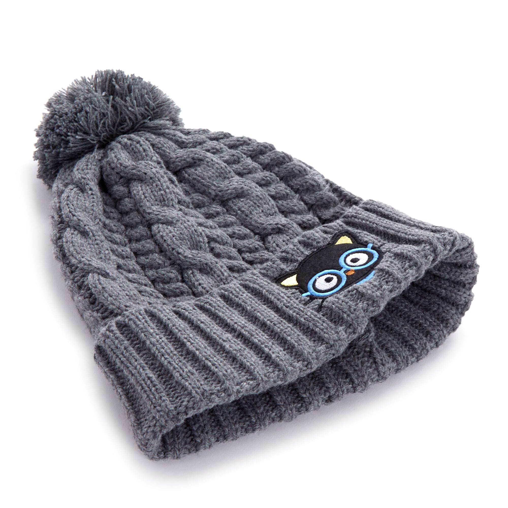 Person wearing Chococat beanie outdoors in snow