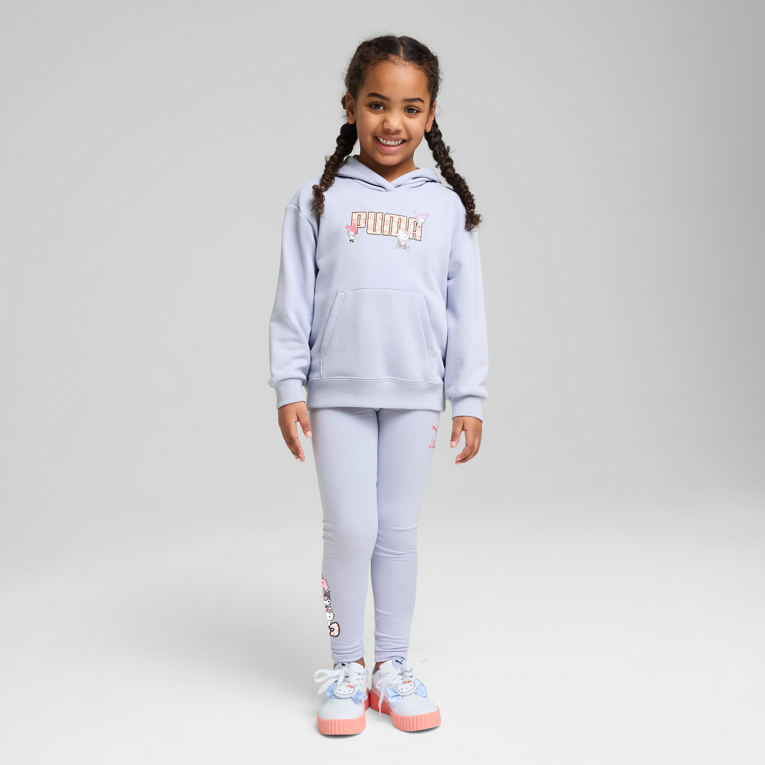 Side angle showing rib-knit cuffs and lightweight fabric in kids hoodie