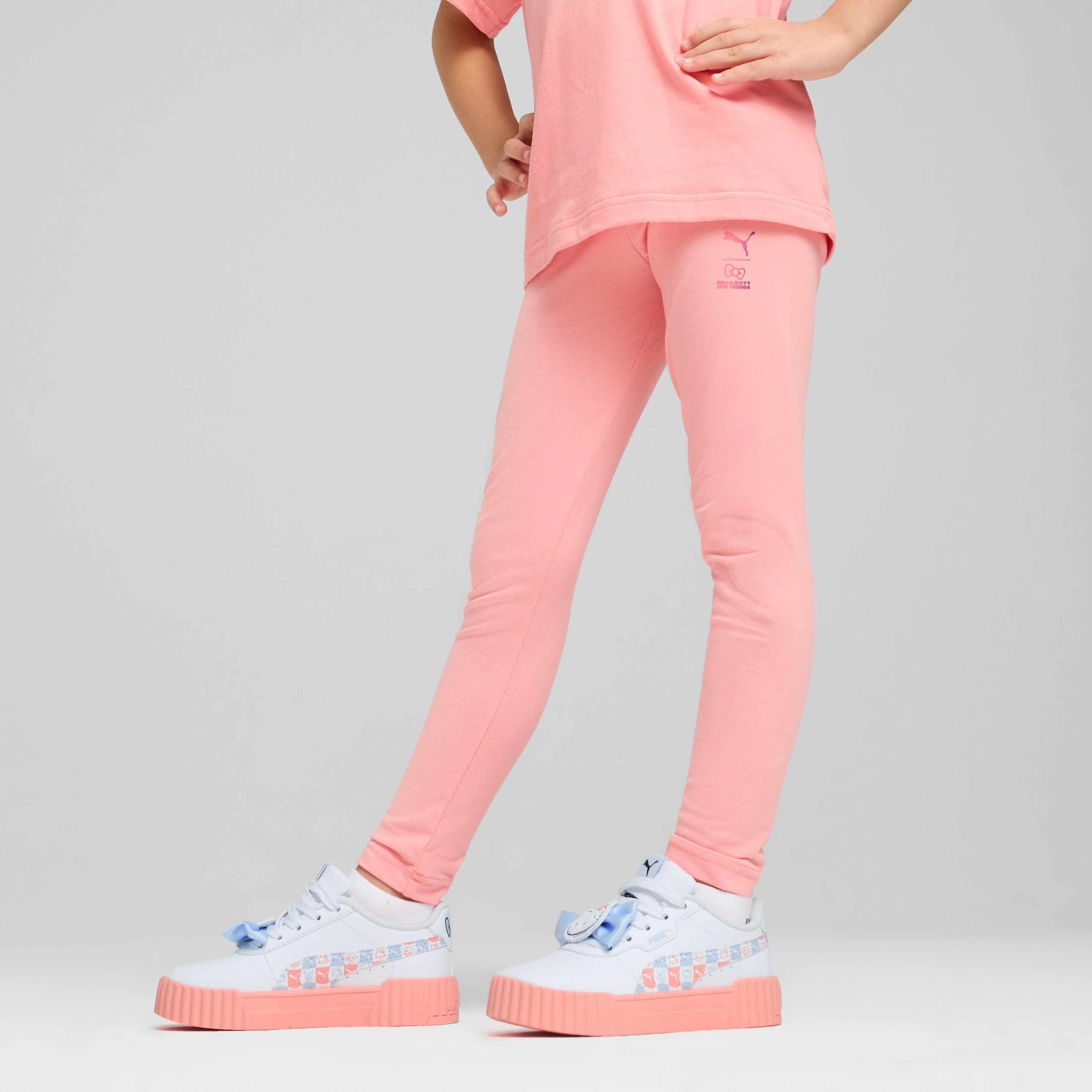 Front view of Hello Kitty high-waist leggings for kids in pink, perfect for casual wear.