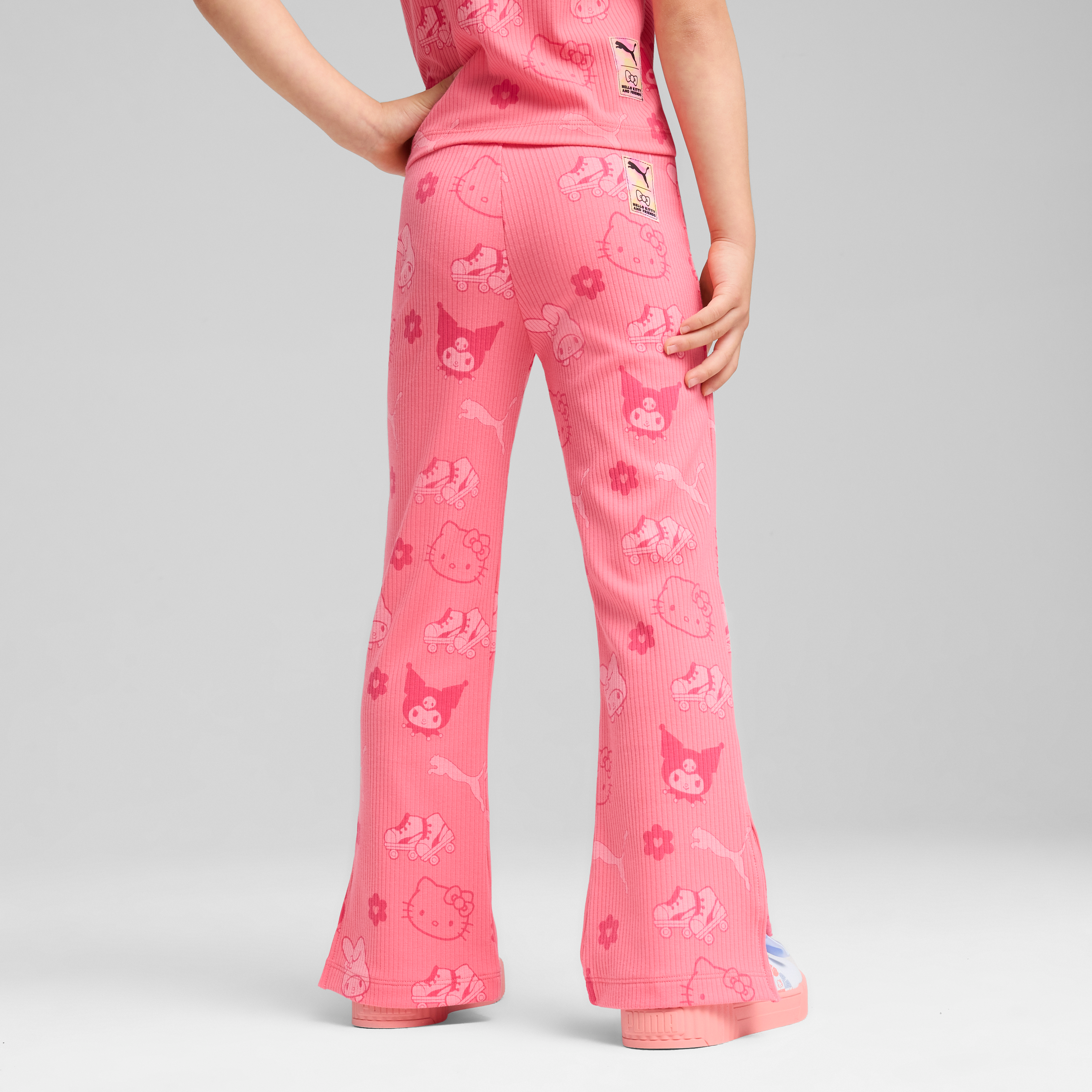 Close-up of split hem detail and flared leg design on kids leggings