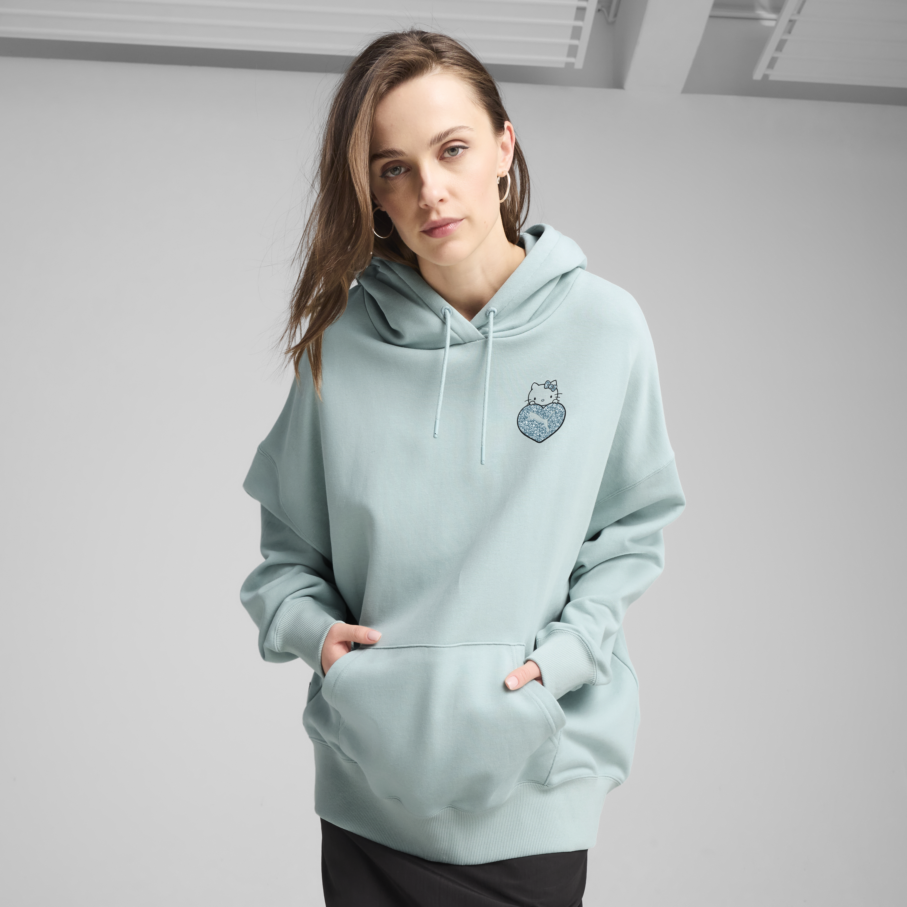 Close-up of Hello Kitty artwork on PUMA hoodie’s back