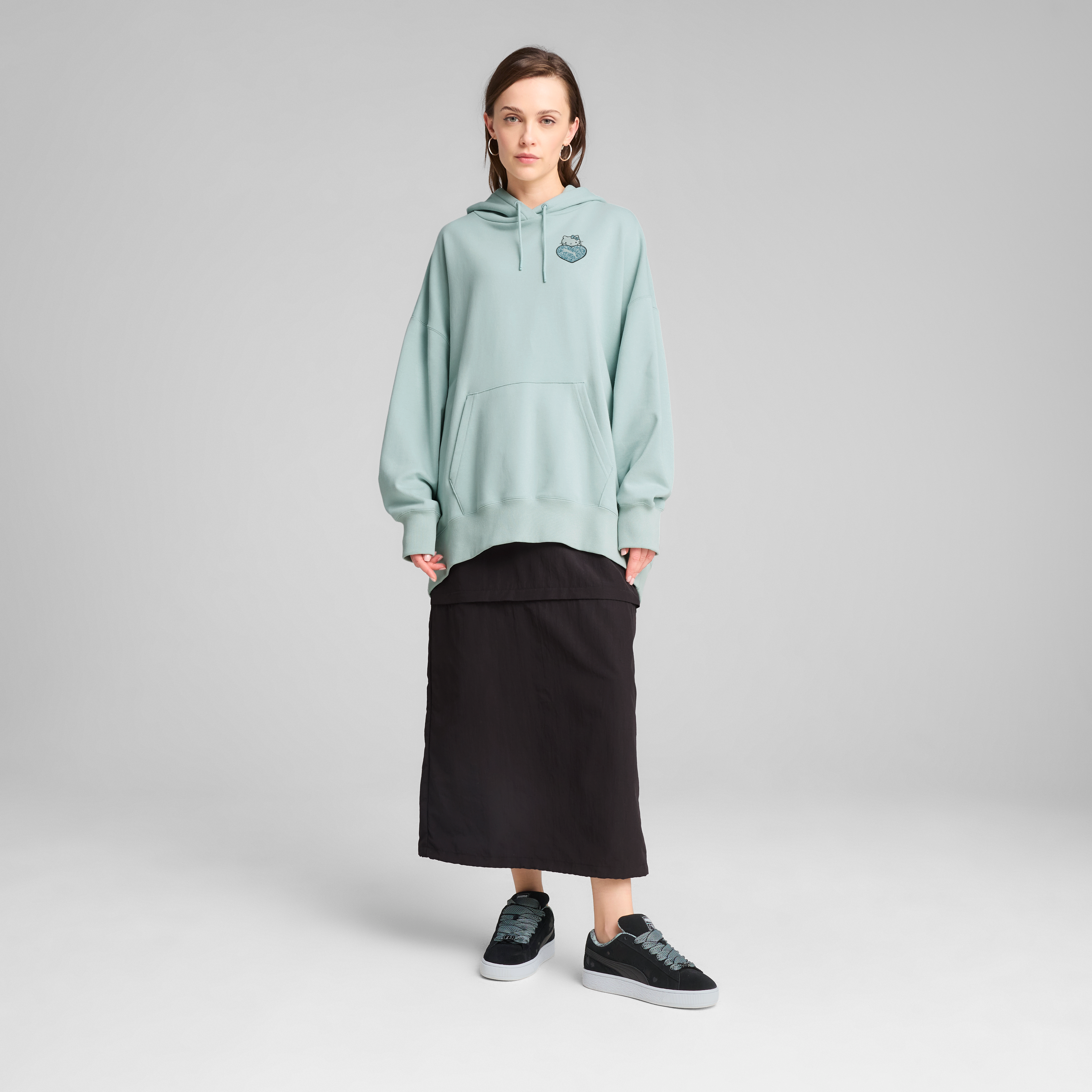 Front view of Hello Kitty x PUMA oversized hoodie in modern mint color.