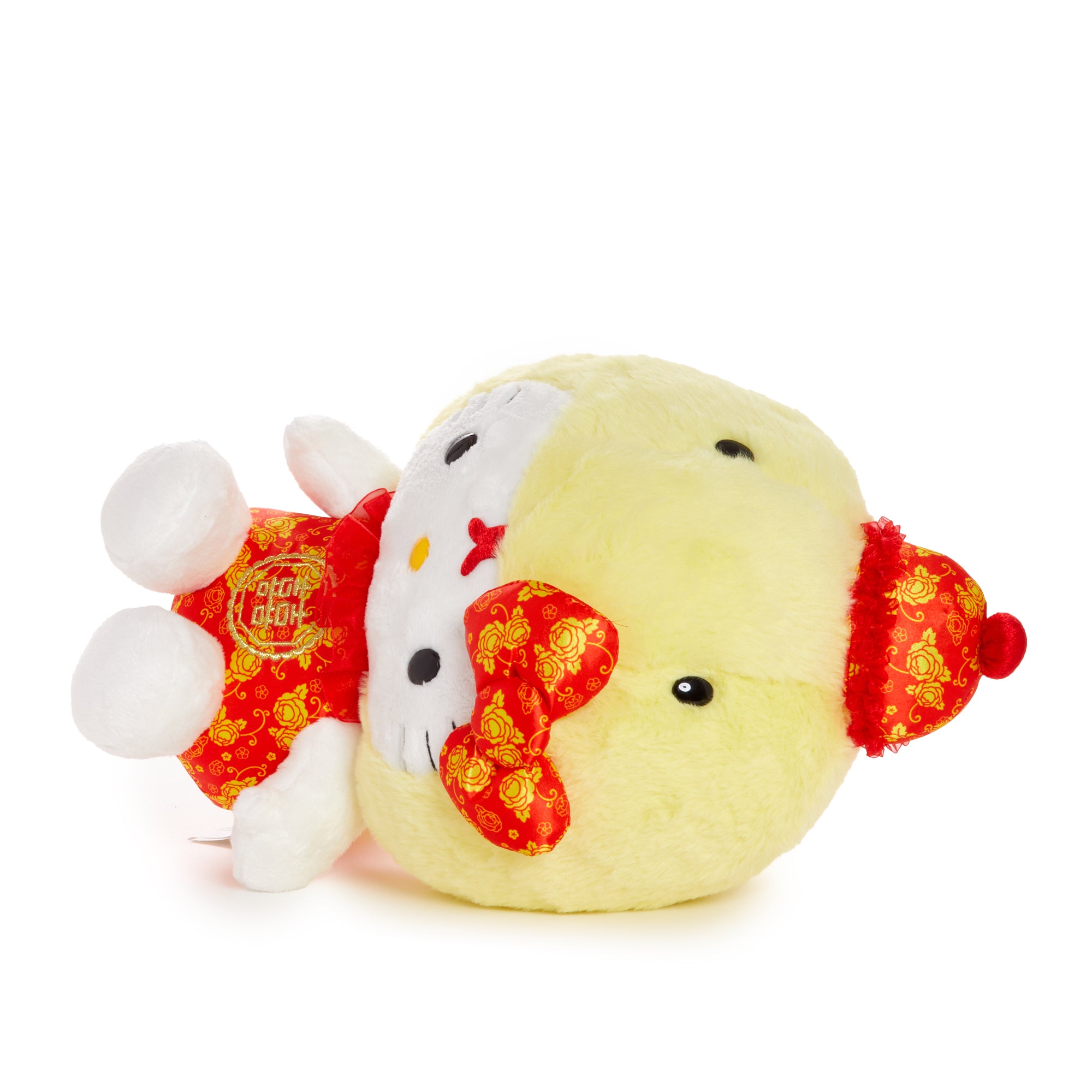 Close-up of Hello Kittys embroidered features and snake headdress.