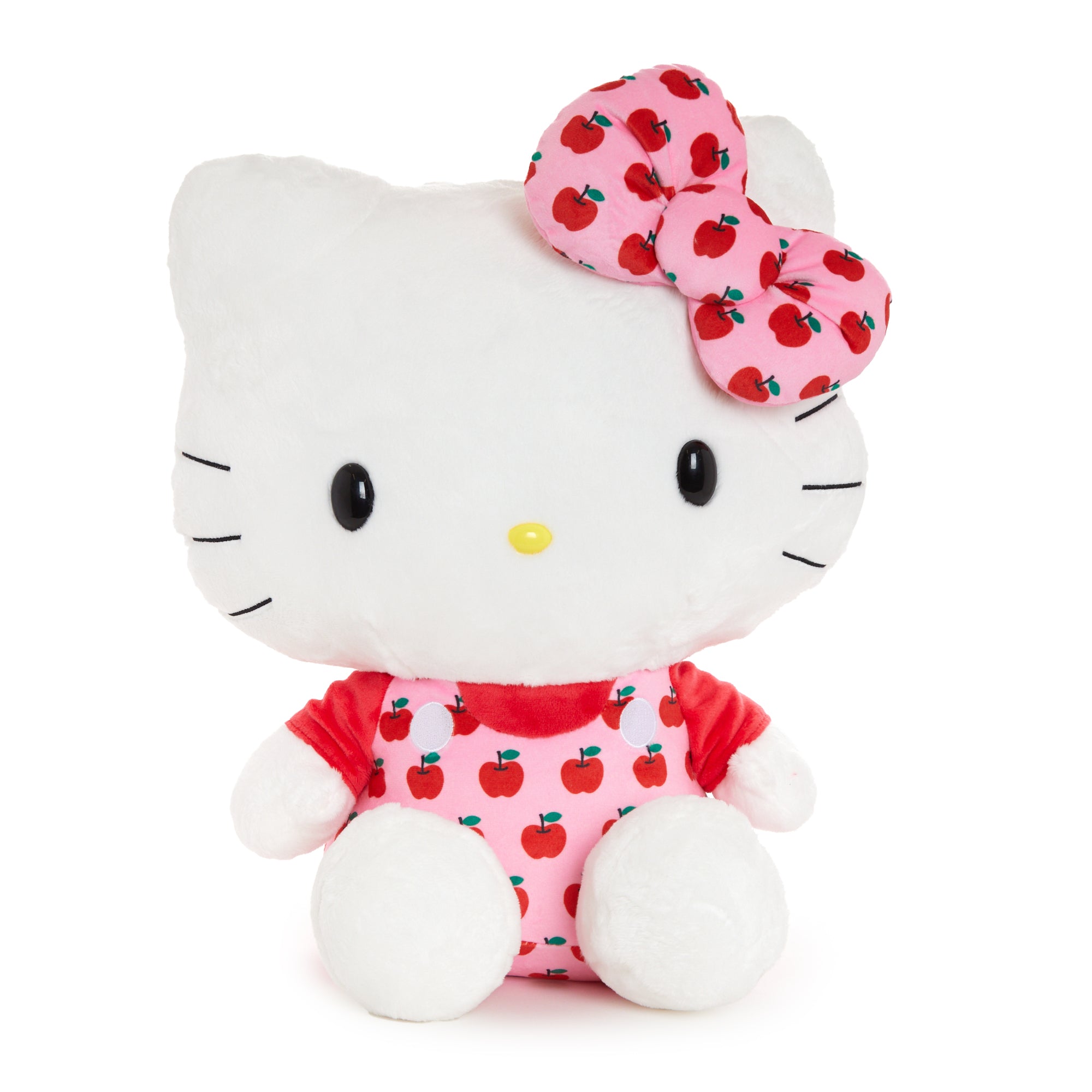 Close-up of the Hello Kitty plush showcasing her pink overalls and bow.