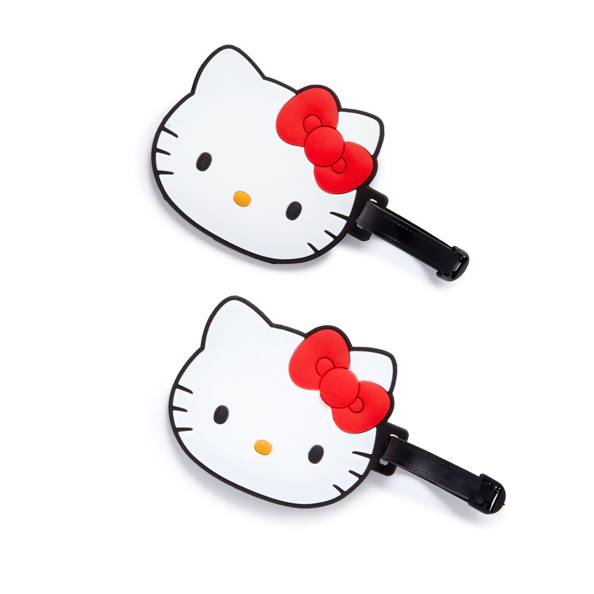 Two Hello Kitty luggage tags attached to different suitcases, demonstrating their versatility and style.
