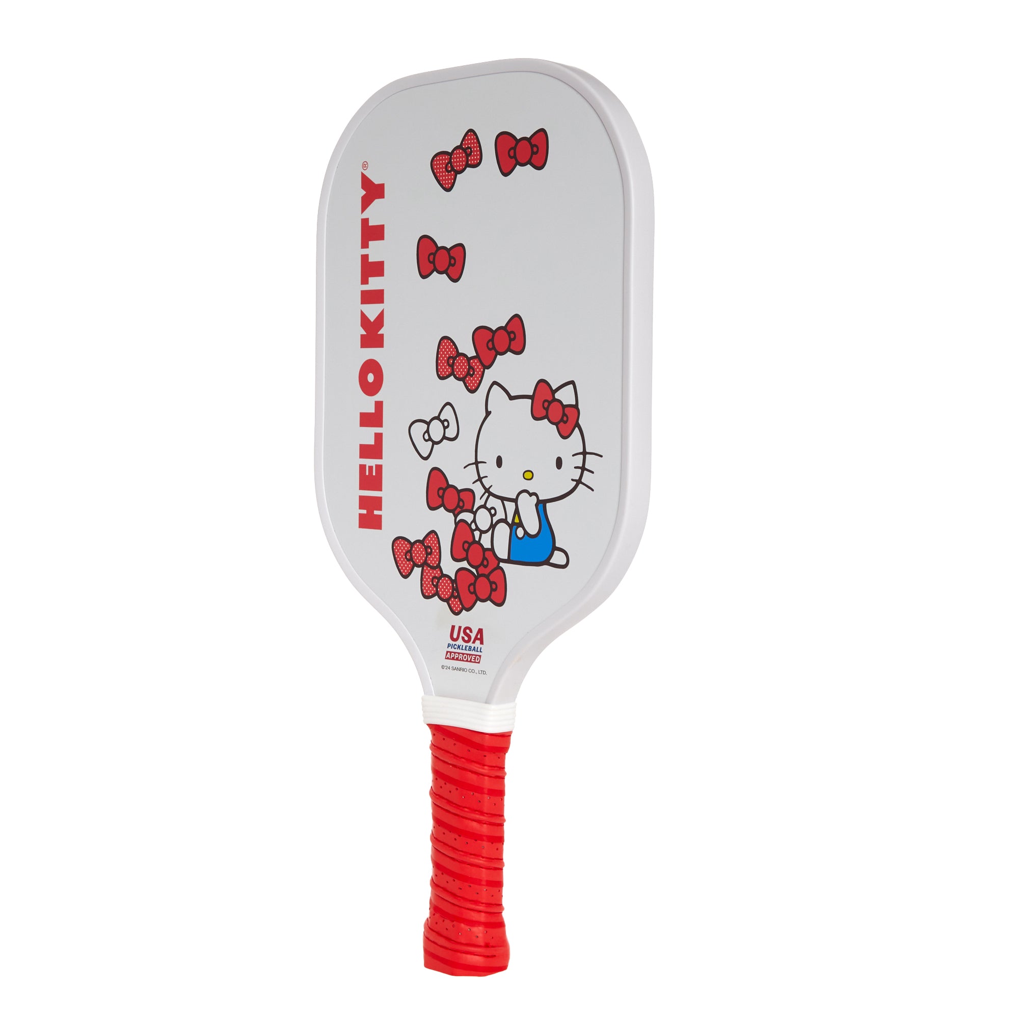 Hello Kitty pickleball set displayed on a sunny court with paddle and balls