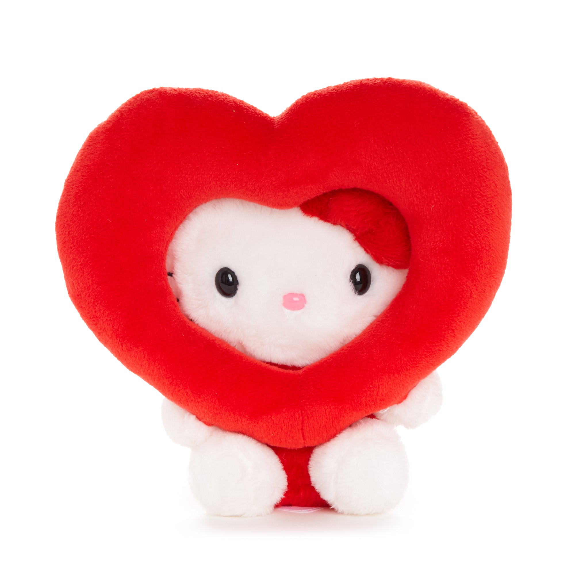 Hello Kitty bean doll plush with wings and heart, sitting in a Valentine’s setting