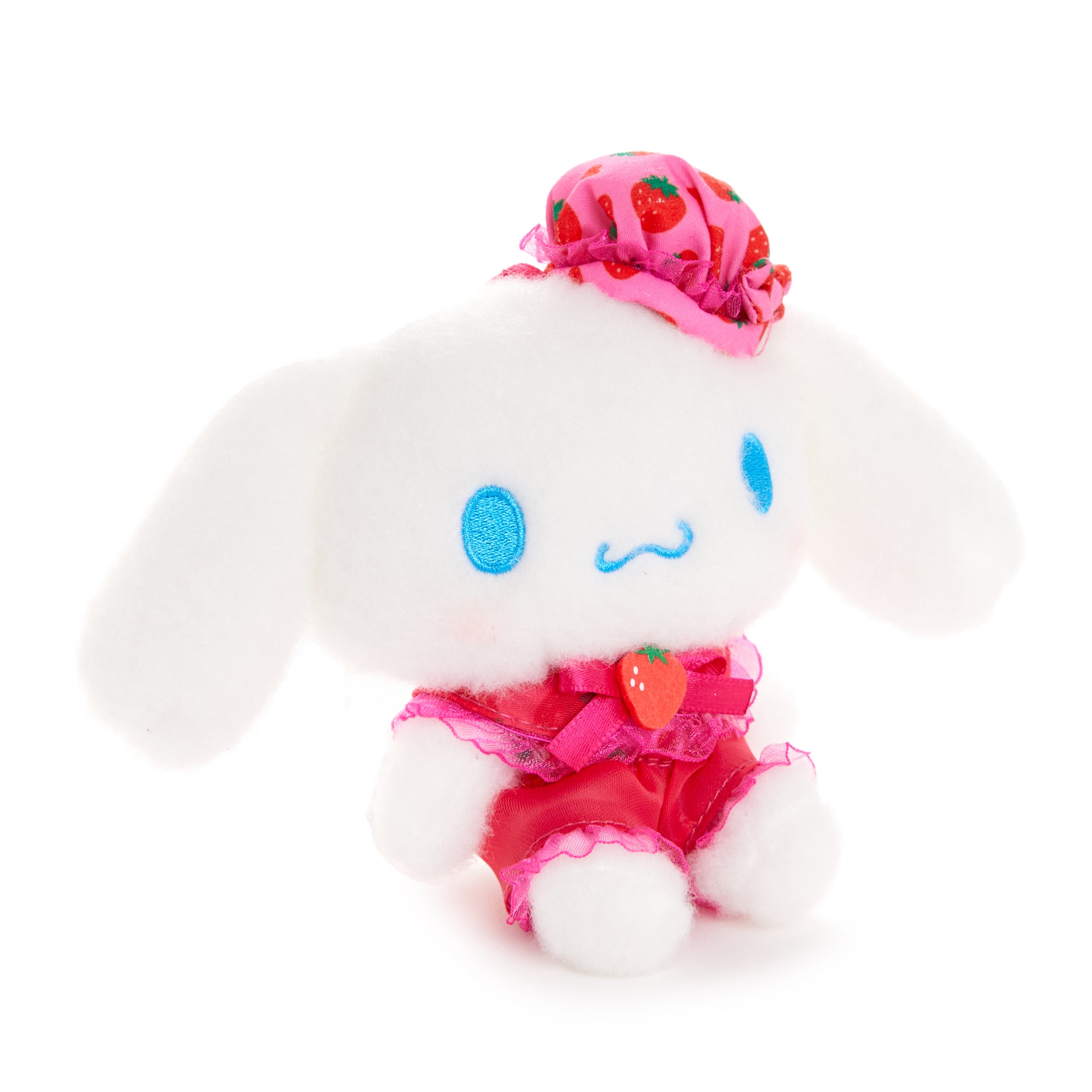 Front view of Cinnamoroll plush clip with strawberry-themed outfit and lace bow