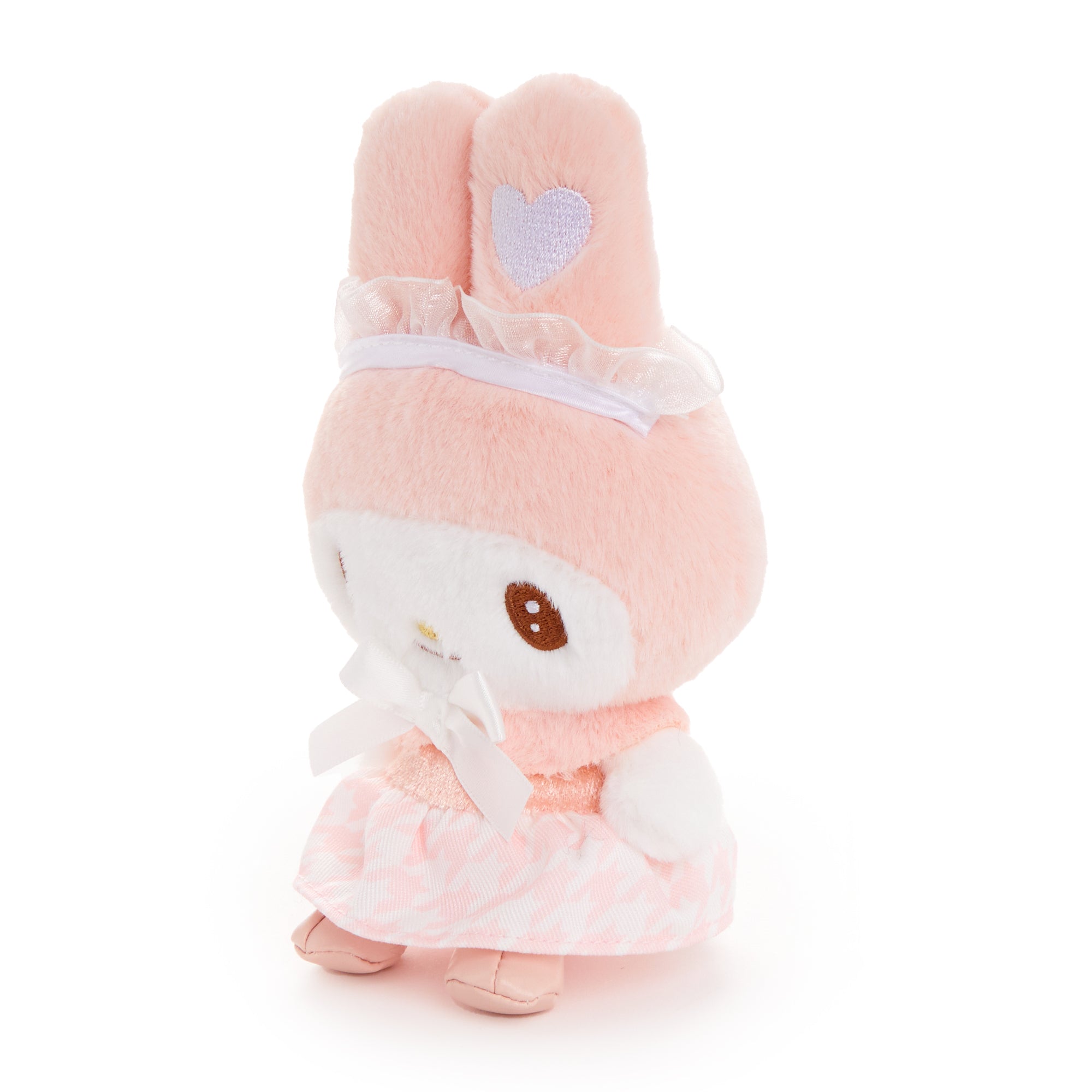 Close-up of My Melody plush charm showing frilly dress and embroidered eyes
