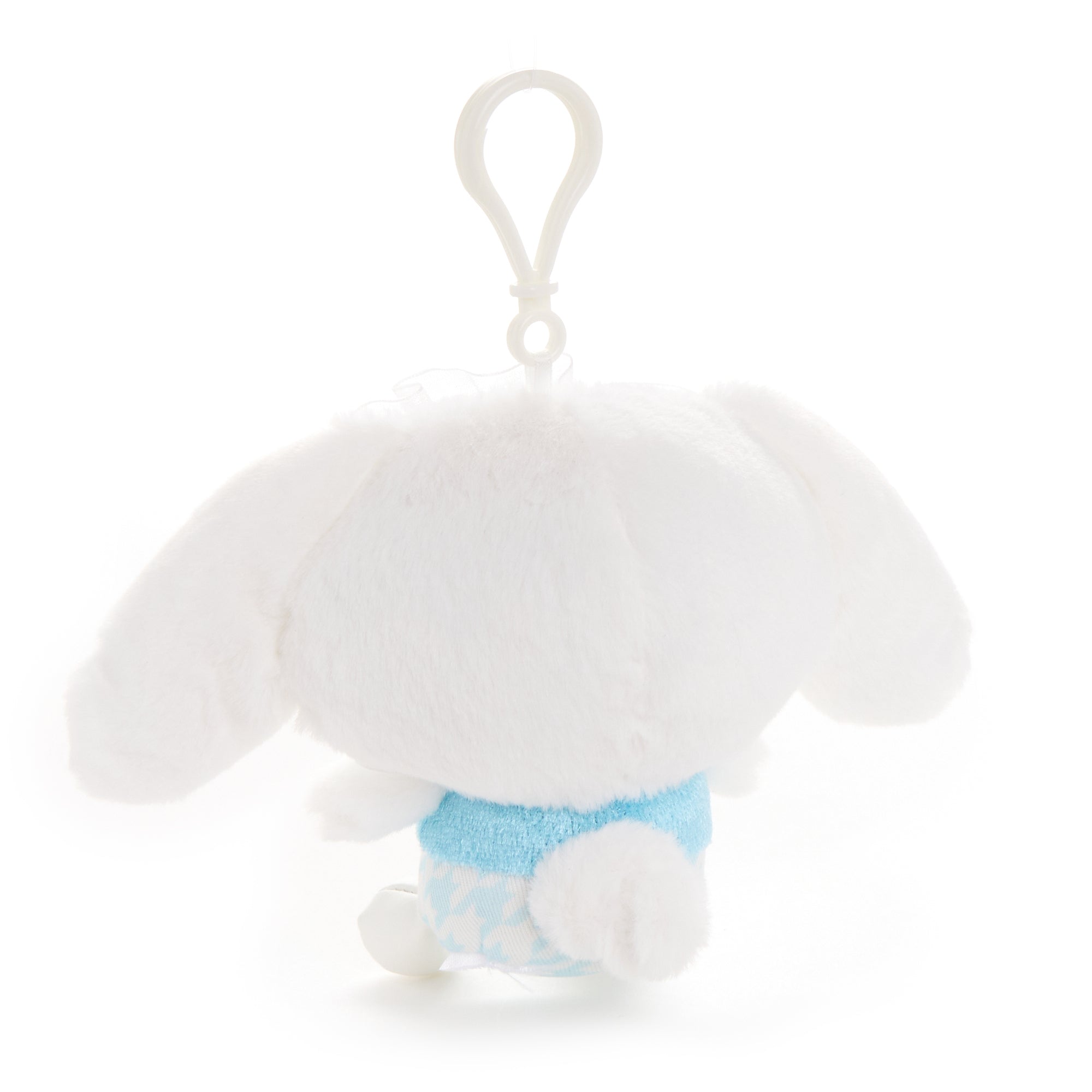 Large Cinnamoroll plush displayed on a pastel pink background, showcasing its frilled ribbon detail.