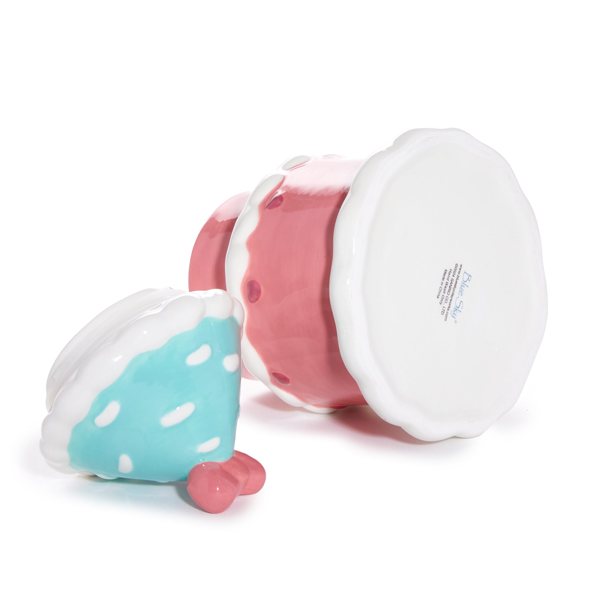 Festive cottage-style Hello Kitty cookie jar displayed with cookies