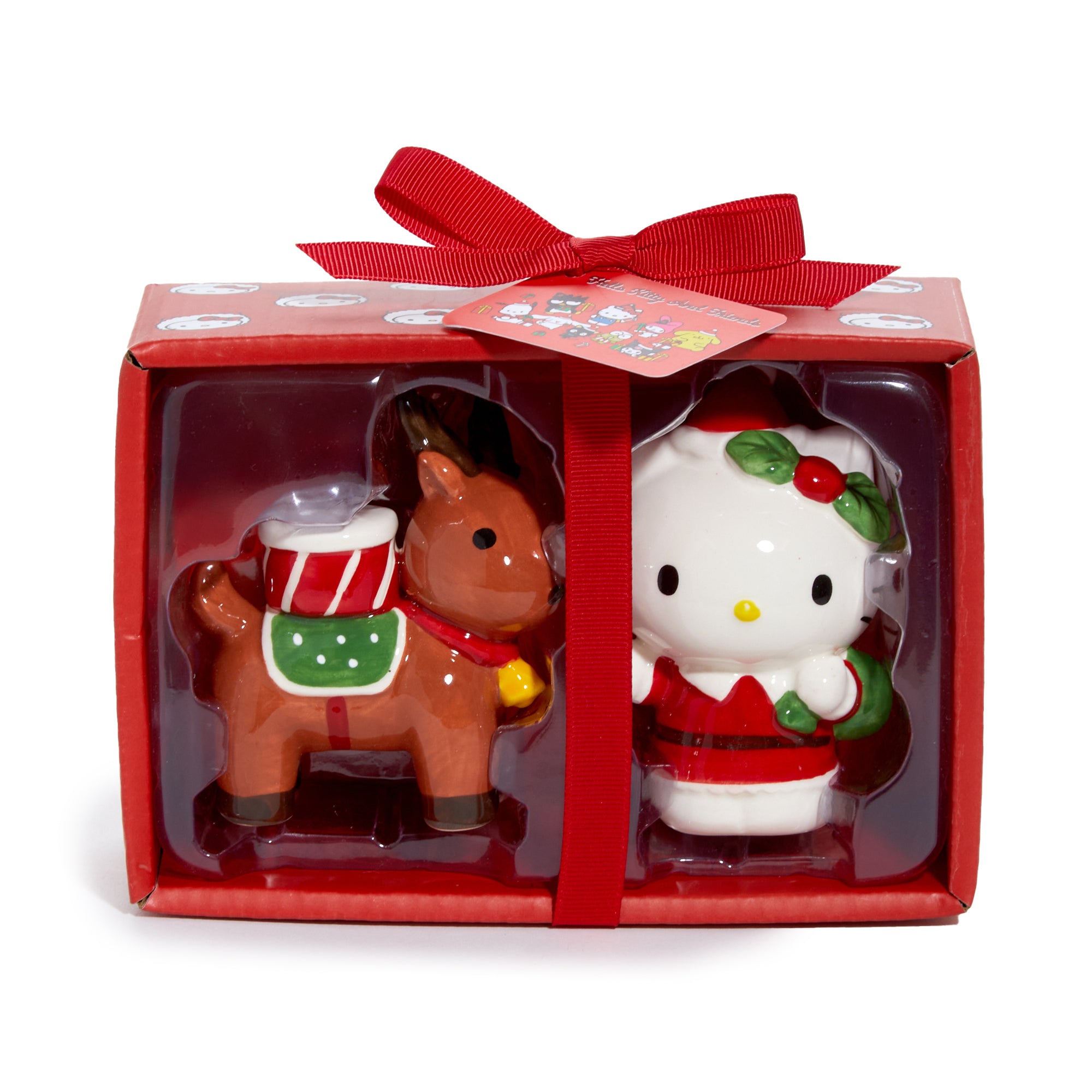 Close-up of Hello Kitty and reindeer friend salt and pepper shakers