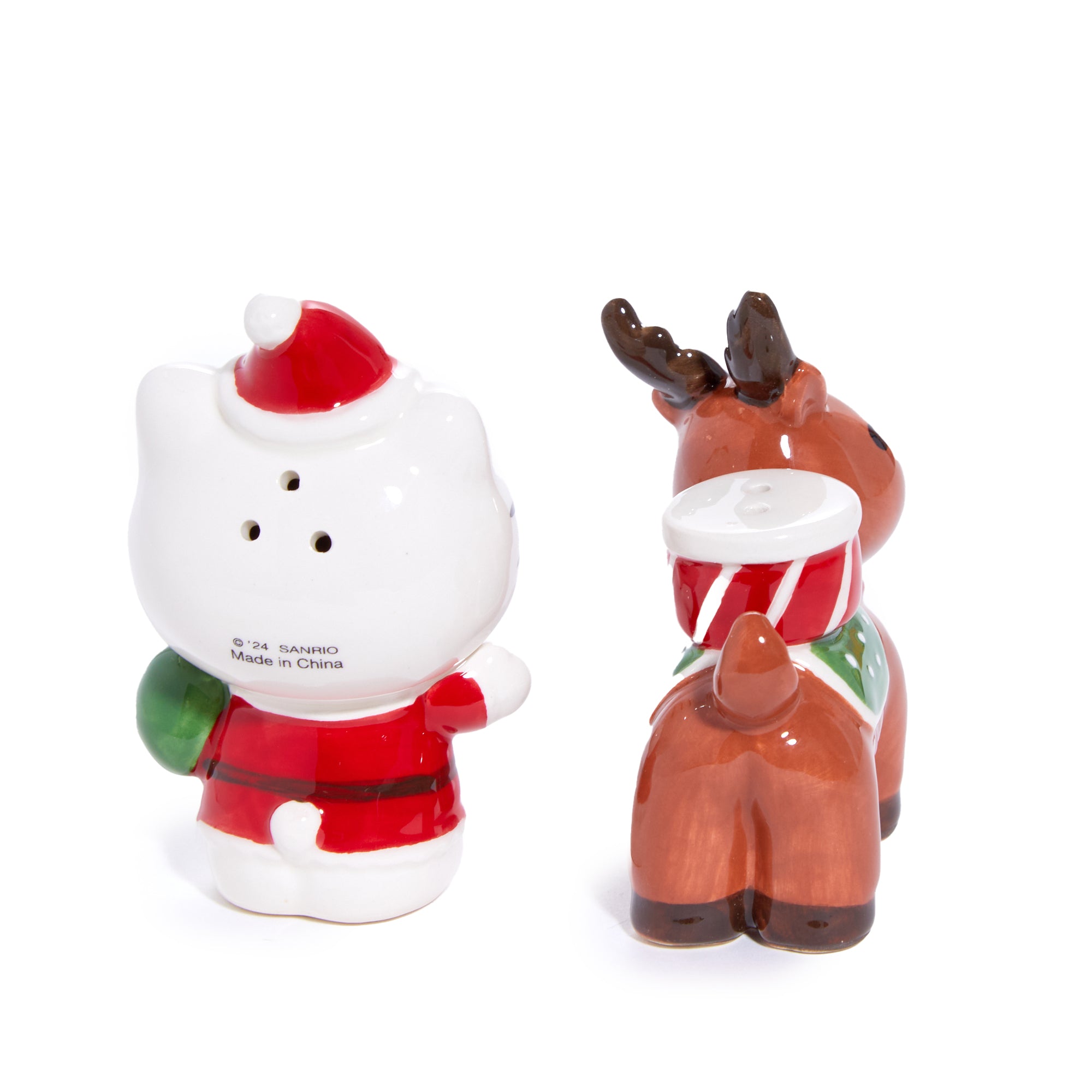 Close-up of Hello Kitty and reindeer friend salt and pepper shakers