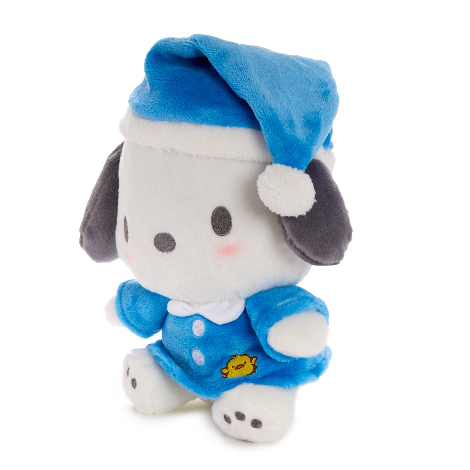 Pochacco plush displayed on a bed with other Sanrio plush toys