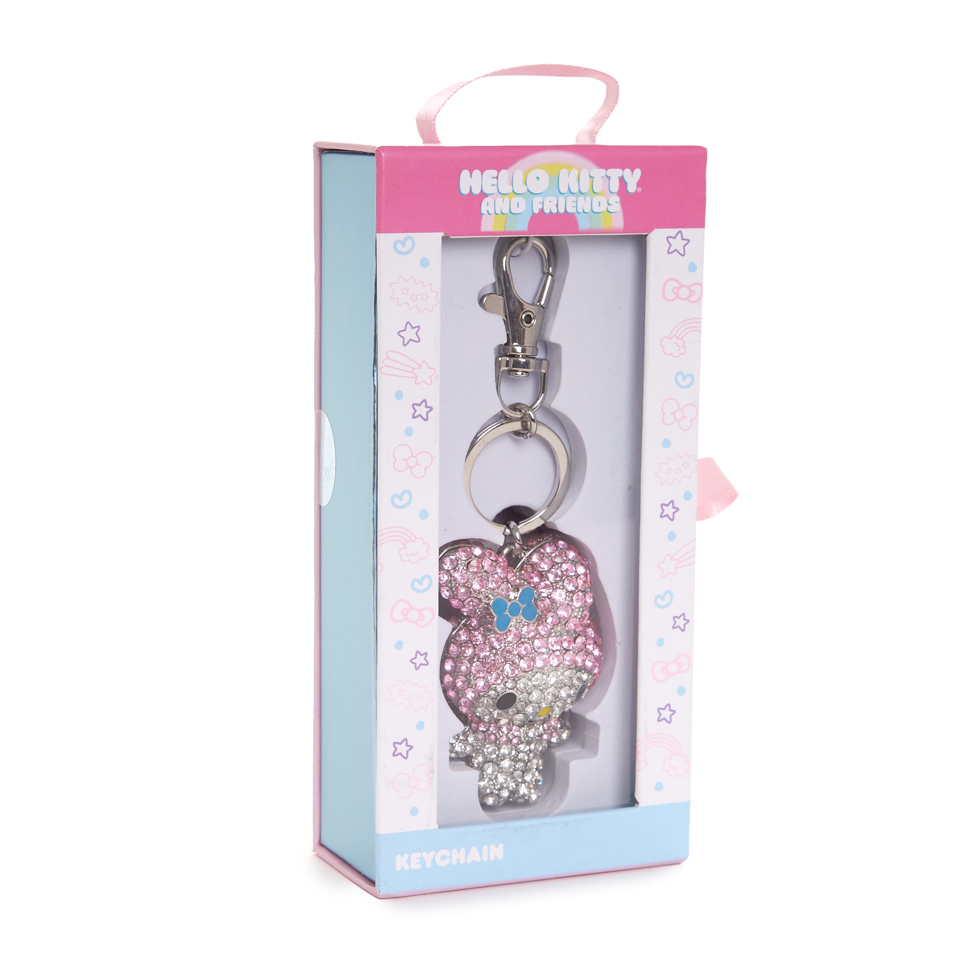 Stylish flat lay of the keychain next to a pink backpack for size reference.