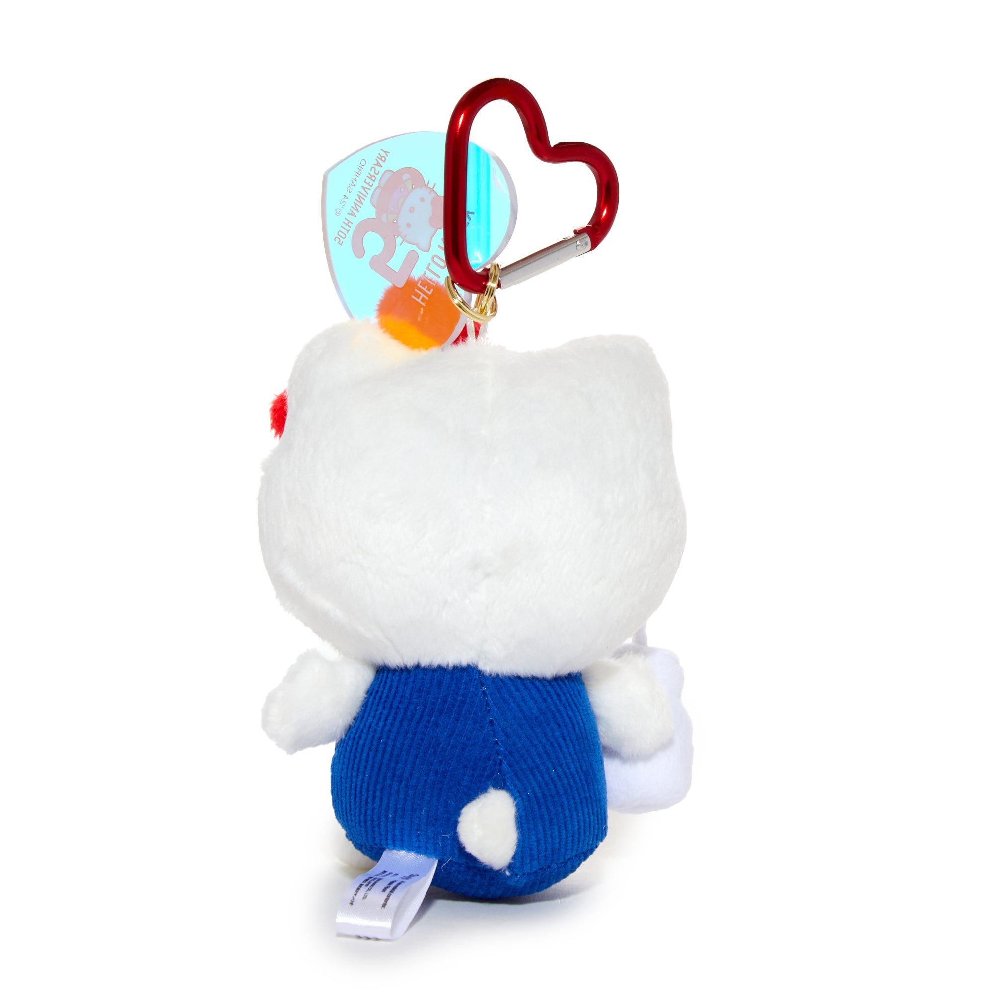 Hello Kitty 50th Anniversary 1974 plush mascot attached to a backpack with heart-shaped carabiner