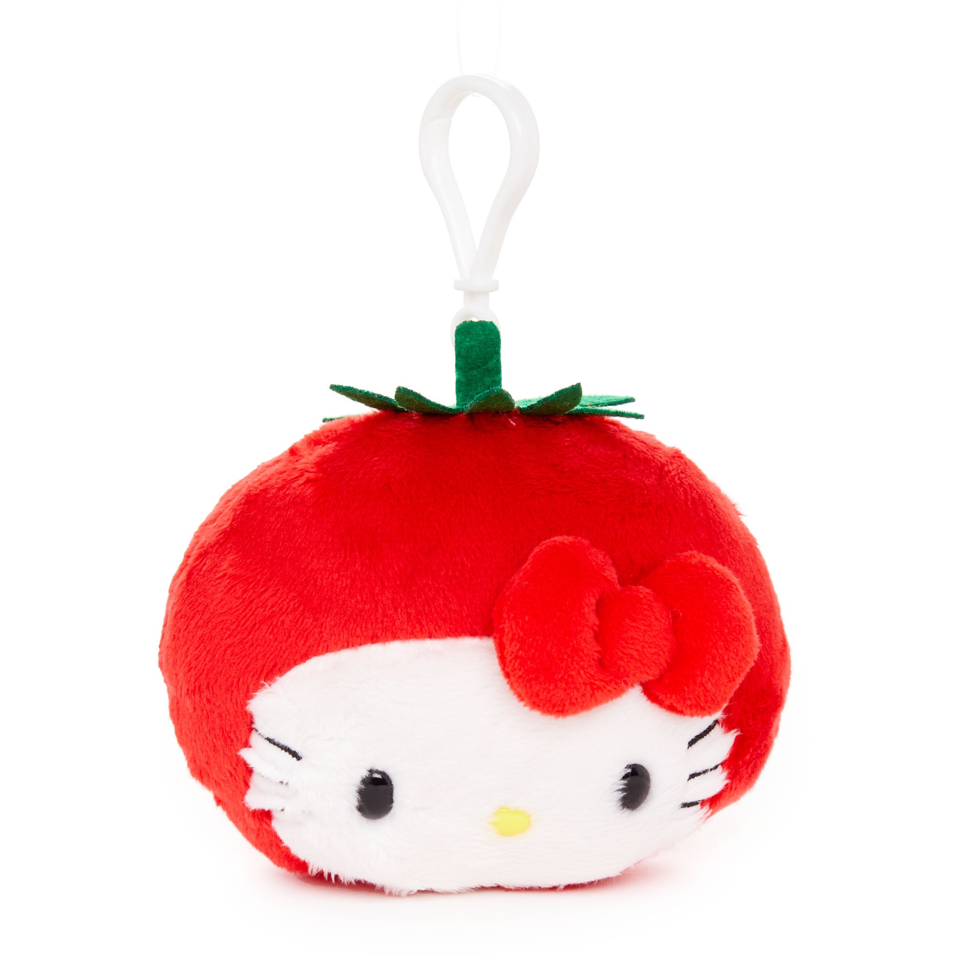 Close-up of Hello Kitty tomato plush bag charm with clip attachment.