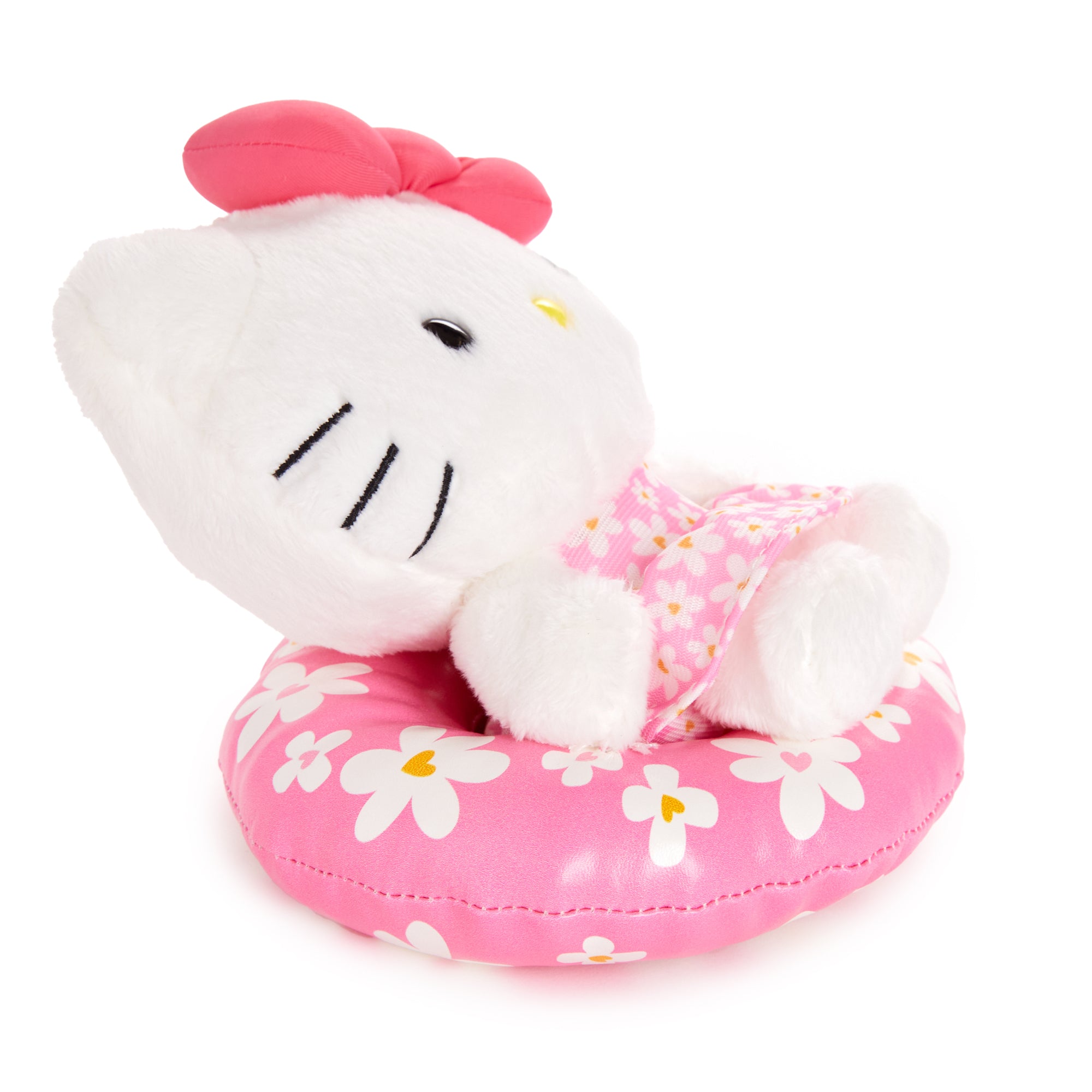 Side angle of summer bean doll showing embroidered details and floral cap