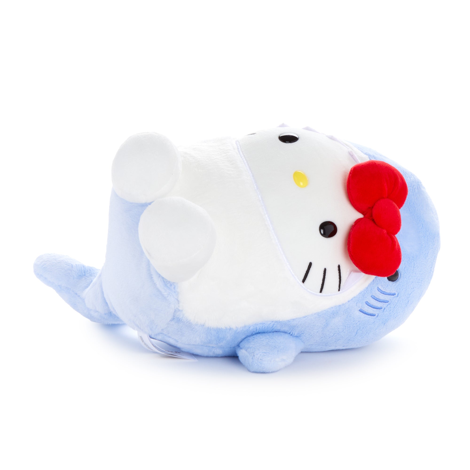 Side view of the Hello Kitty plush toy highlighting its adorable features