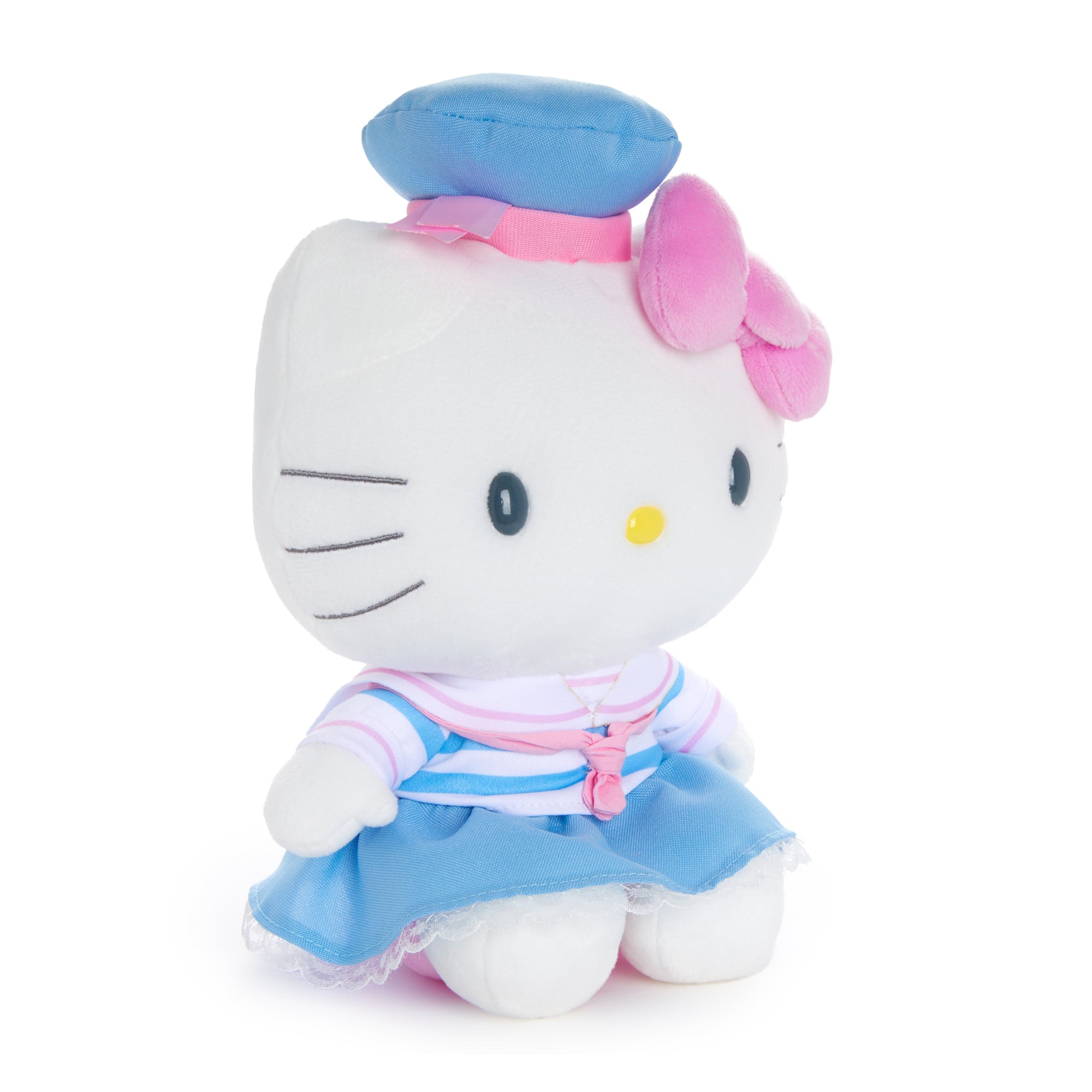 Hello Kitty plush backpack style with straps displayed on beach tote background