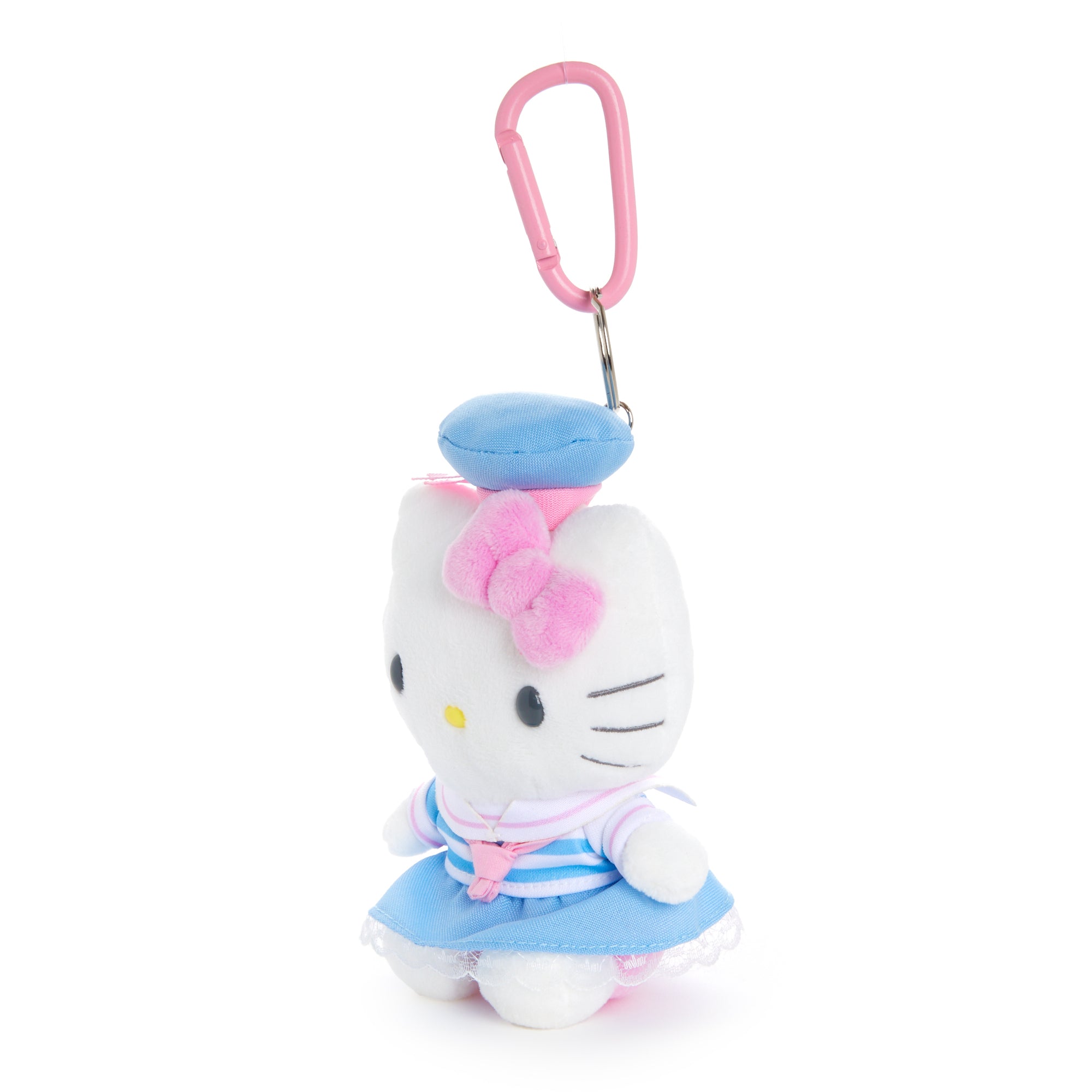 Pastel Hello Kitty sailor keychain attached to a handbag strap