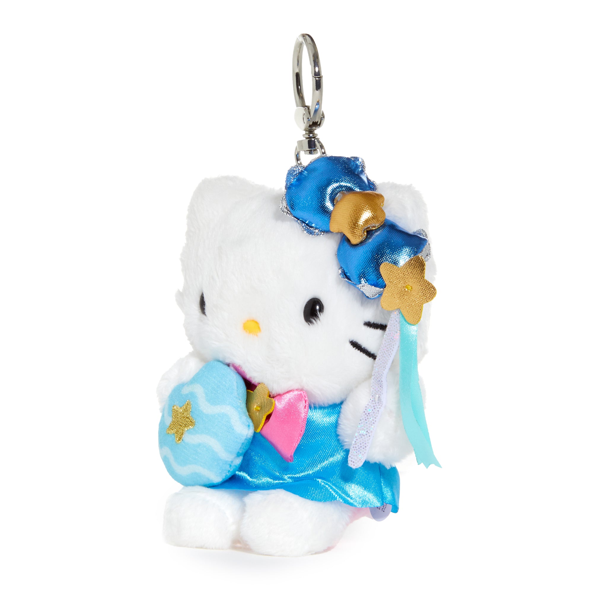 A person attaching the Hello Kitty Aquarius plush keychain to their bag, demonstrating its usability.
