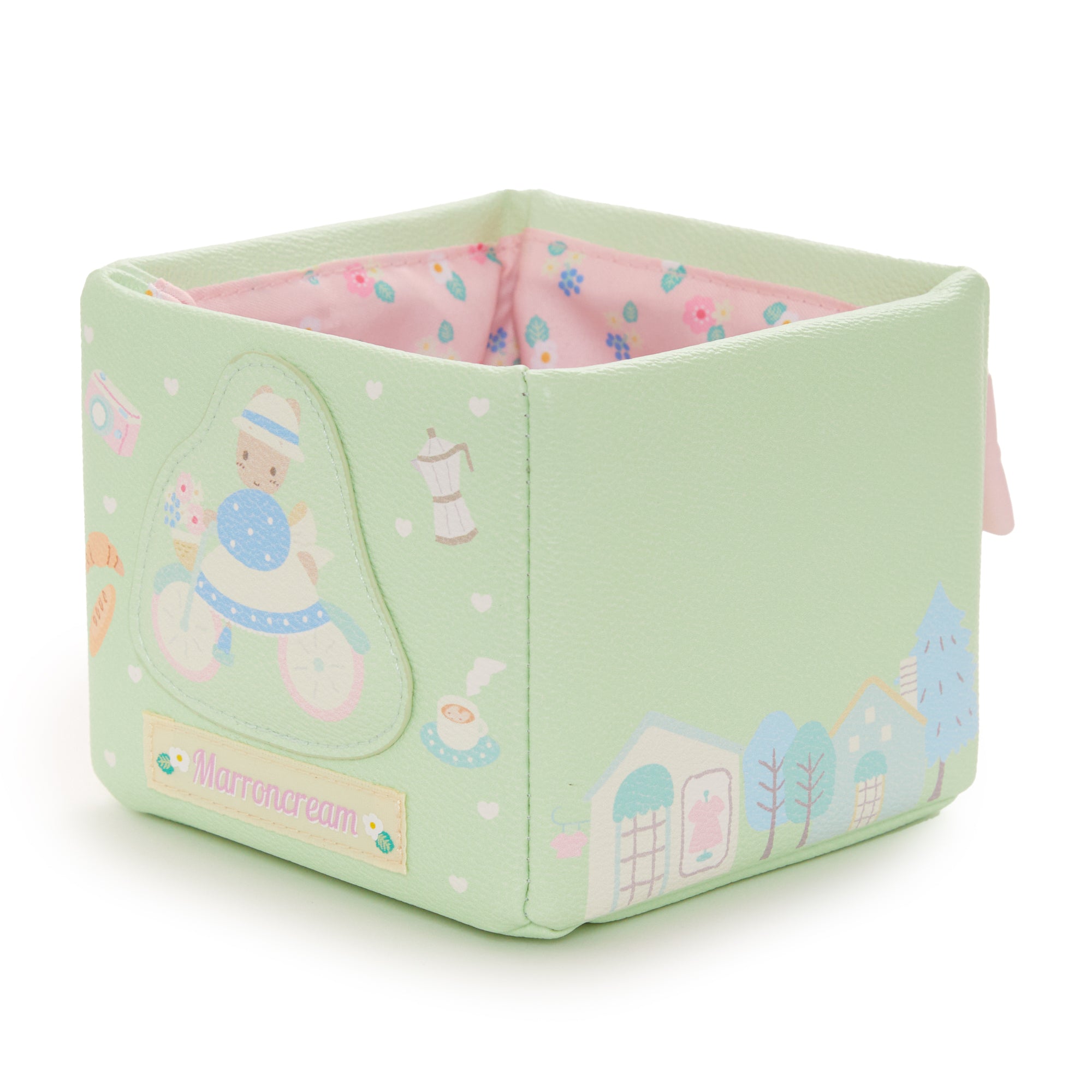 Close-up of the embroidered details on the Marron Cream mini storage box.