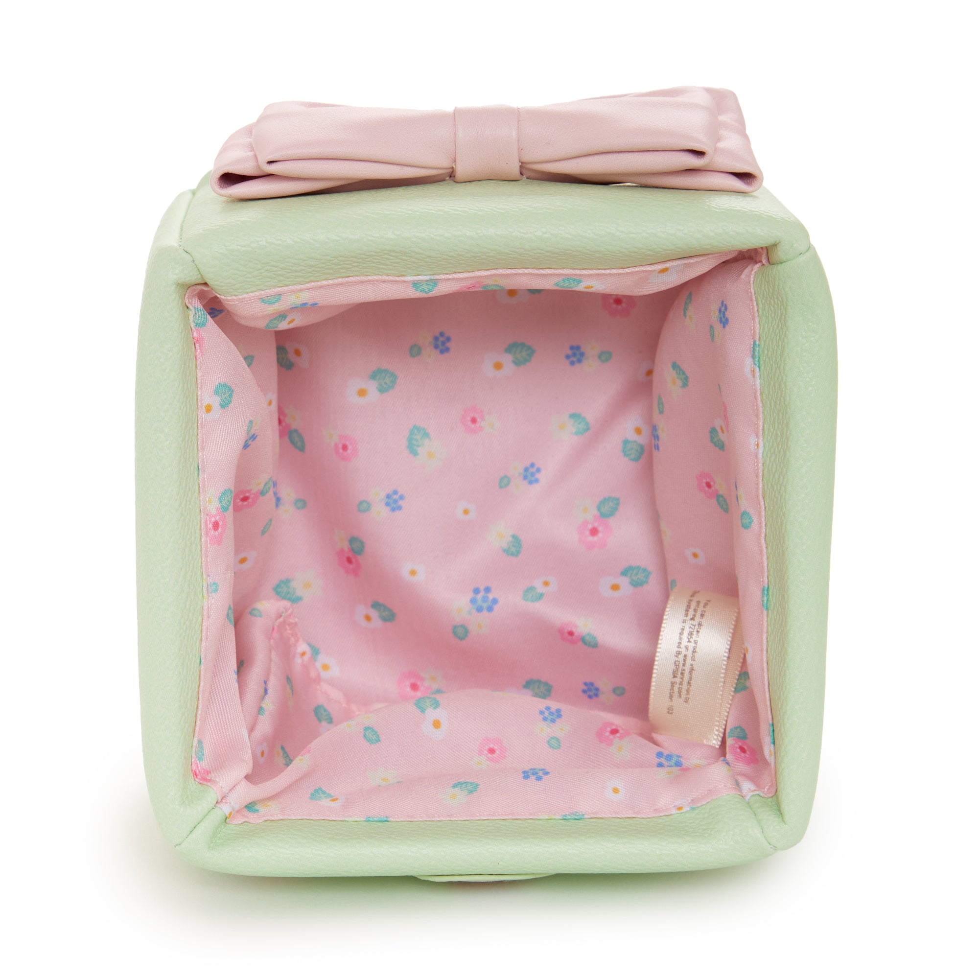 Marron Cream mini storage box in a travel setting, perfect for organizing essentials.