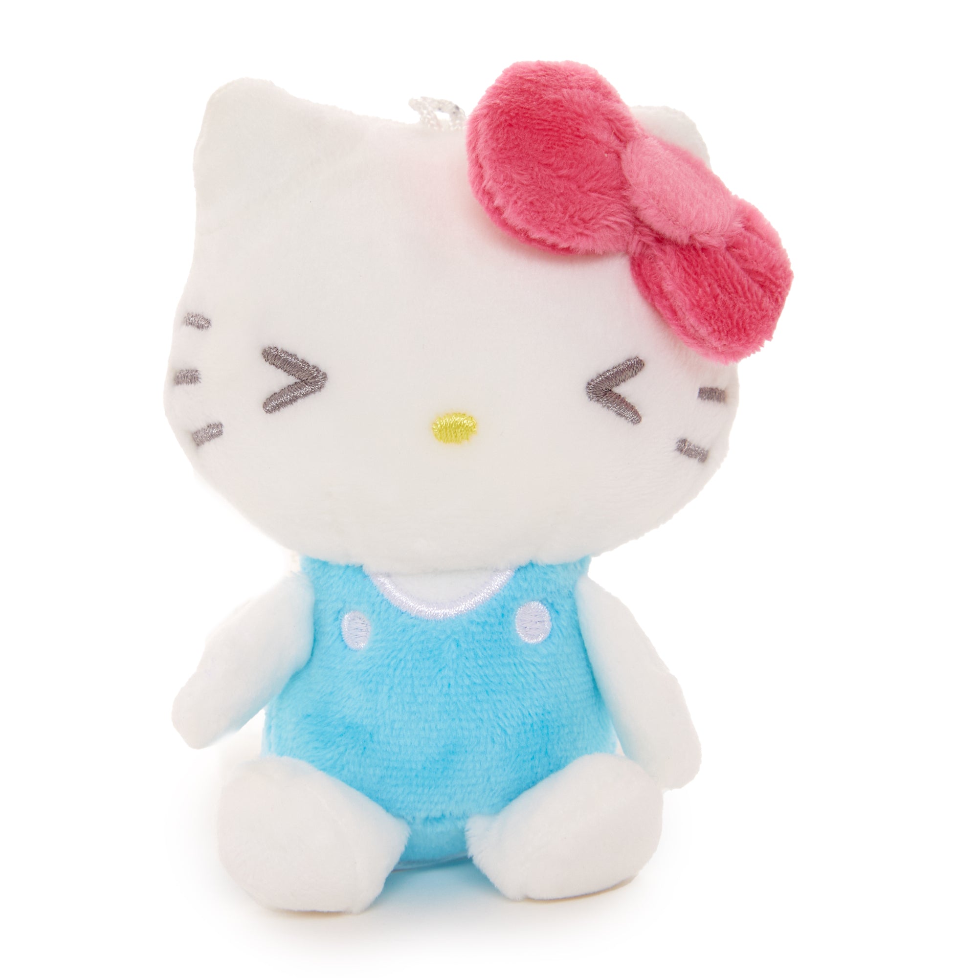 Frightened Series keychain next to other Sanrio collectibles