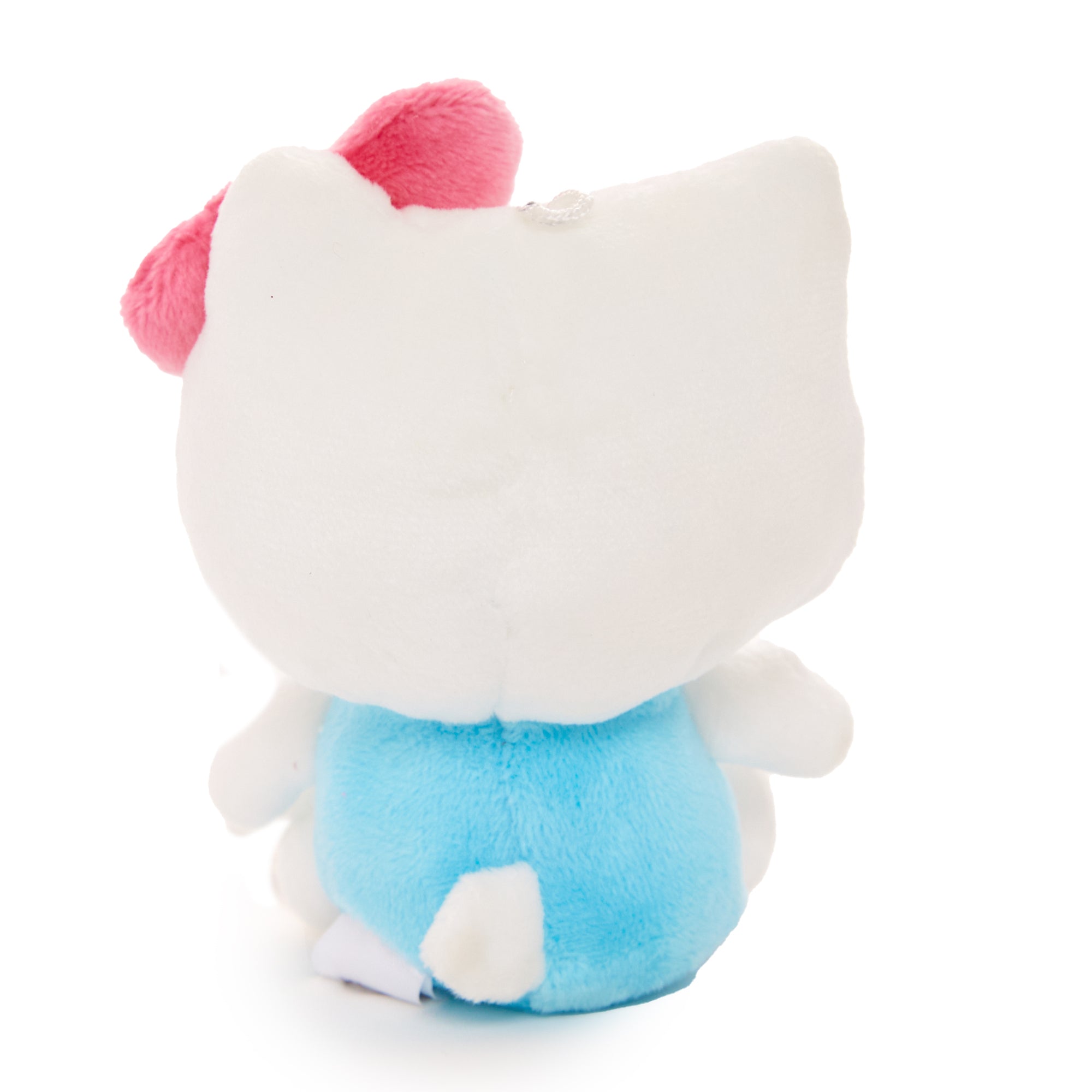 Close-up of Hello Kitty plush keychain with frightened expression and cape