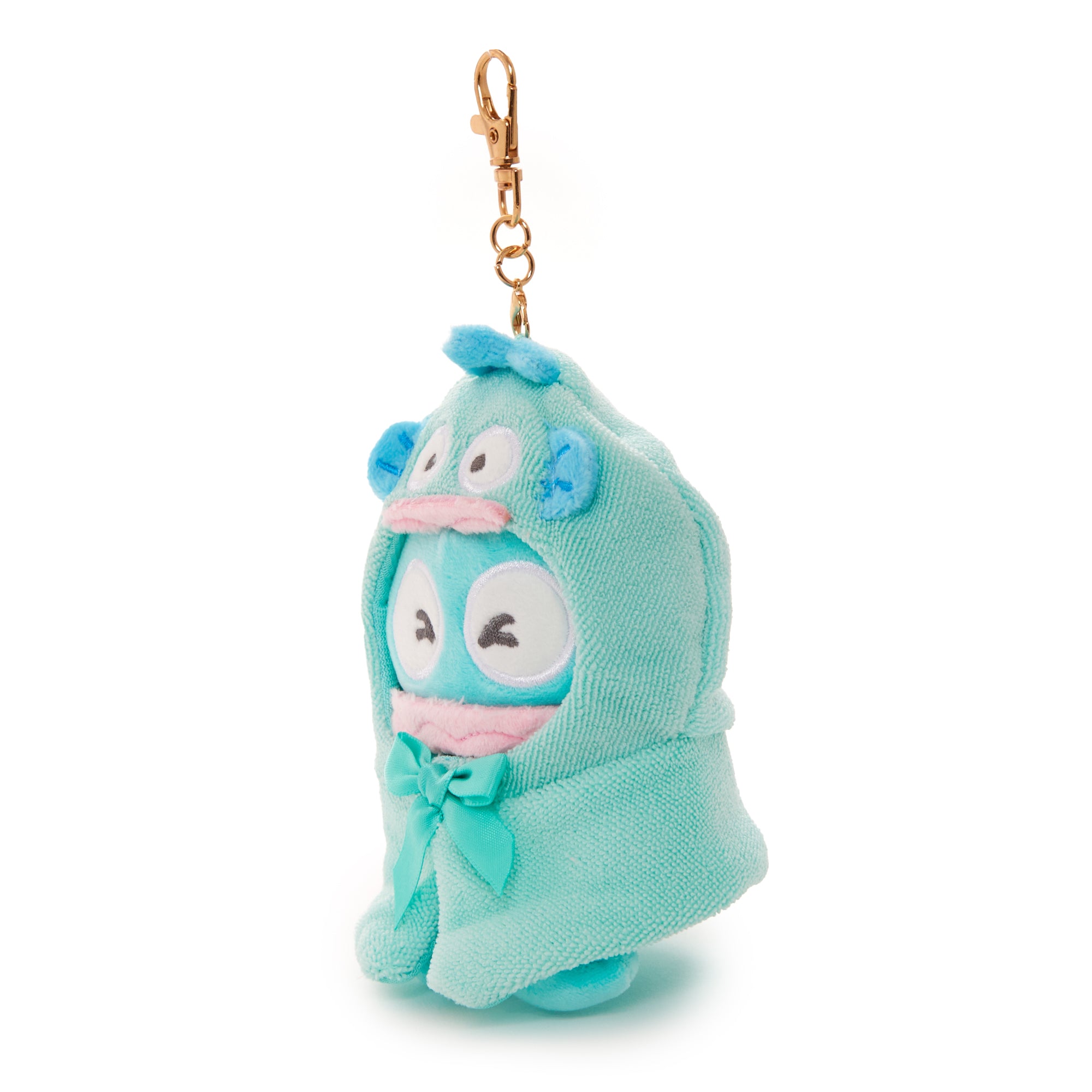 Frightened Hangyodon plush keychain with removable cape, showcasing its cute design.